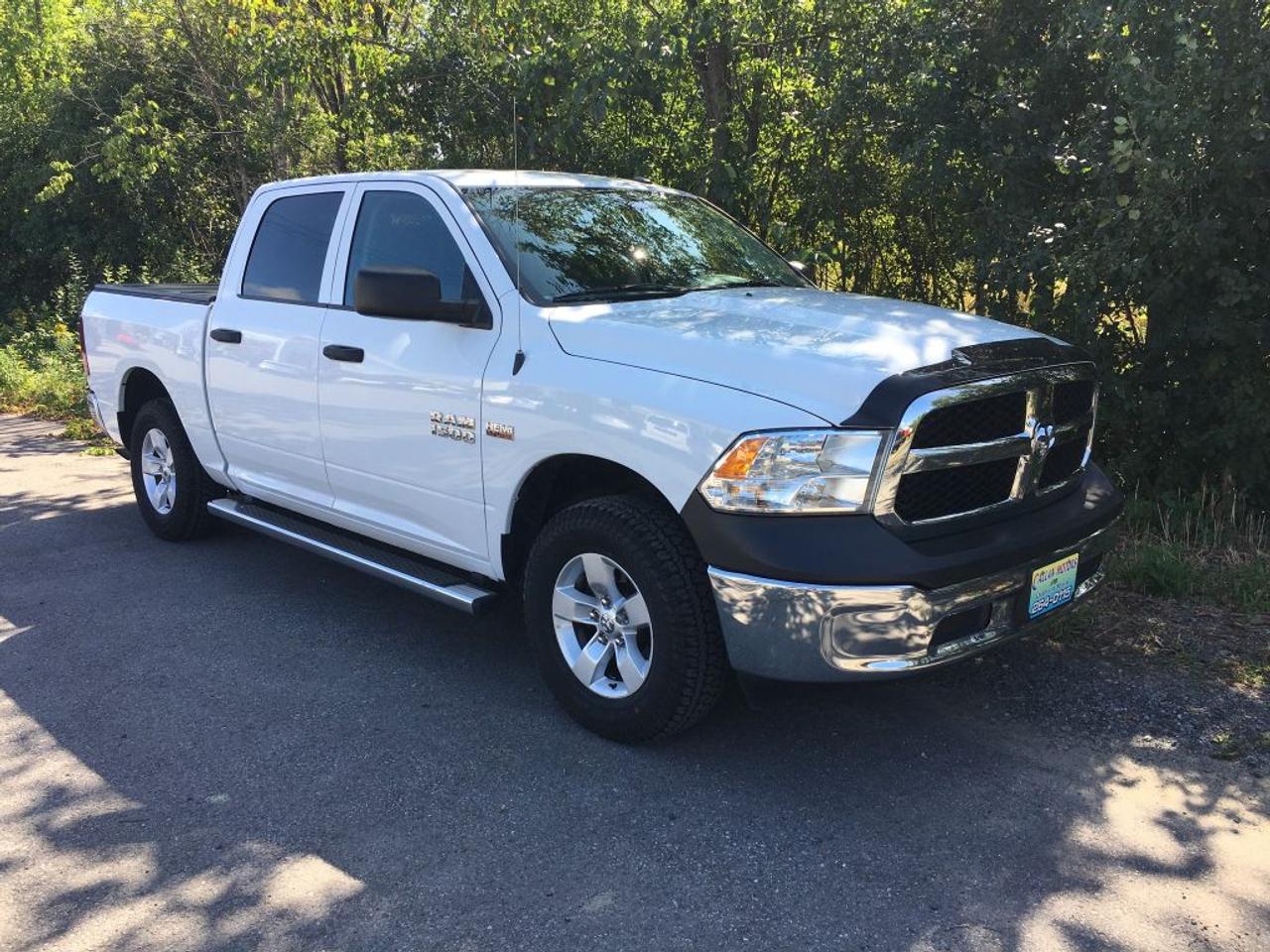 Wow what a great price , local truck , clean car proof , fully loaded crew cab , V 8 Hemi , hard tonneau cover , box liner , running boards , 4 new tires , financing is available for up to 84 months OAC