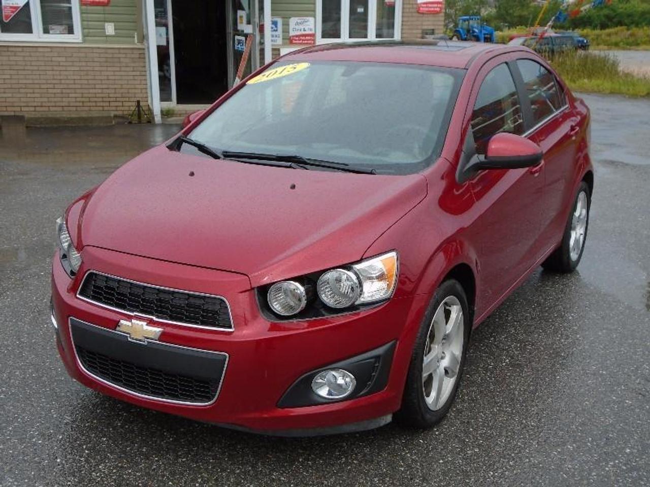 LOCATED AT
<a href=http://http://www.fairwayhonda.com rel=external>Fairway Honda</a>
30 Confederation Drive
Corner Brook  A2H-6T2
(709) 634-8881
1 (877) 373-5681

THIS SPORTY 2015 CHEV SONIC IS IN LIKE NEW CONDITION AND HAS JUST 9,986 KMS!!! YES, THATS RIGHT - UNDER 10,000 KMS SO THERE IS LOTS OF CHEV FACTORY WARRANTY REMAINING. LOOKS AMAZING IN THE CRYSTAL RED TINT PAINT, ALLOY WHEELS AND POWER SUNROOF - PLUS CREATURE COMFORTS INSIDE INCLUDE POWER WINDOWS, LOCKS & MIRRORS, CRUISE, AIR, TILT WHEEL, BLUE TOOTH, AUTOMATIC, BACK UP CAMERA, ONSTAR & MUCH MORE!!!

Remainder of Factory Warranty.