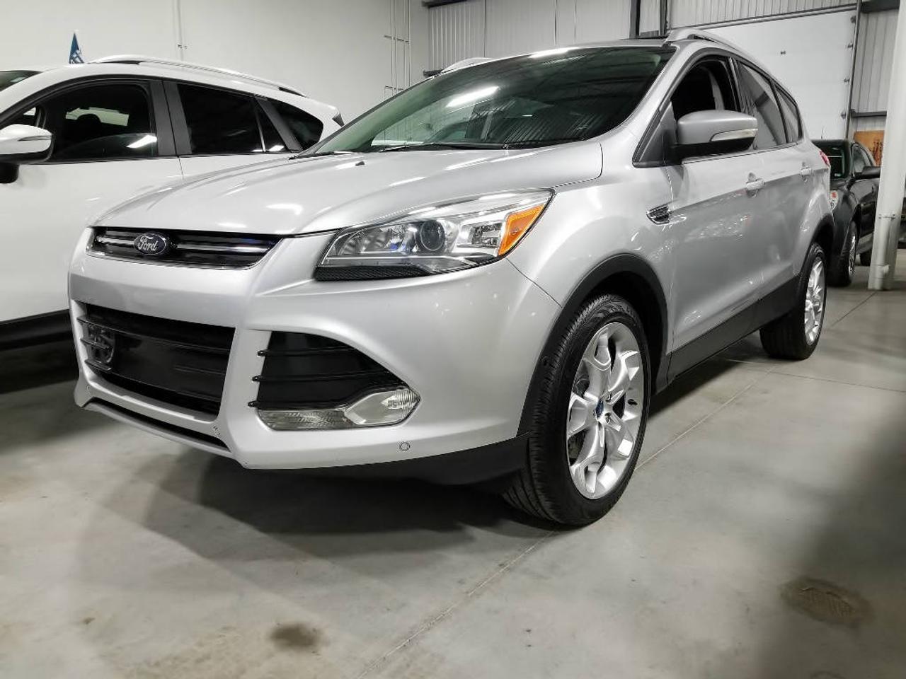<a href=https://www.mdfautos.ca/occasion/Ford-Escape-2014.html>https://www.mdfautos.ca/occasion/Ford-Escape-2014.html</a>

Modèle Titanium - AWD - Cuir - Toit Panoramique - Navigation - 2.0L Ecoboost - Caméra de recul - Stationnement Automatisé - Bluetooth - Groupe Électrique - Financement disponible.

**** Appelez ou textez au 514-984-3584 pour céduler votre essai routier ****

** Véhicules doccasion à Saint-Eustache - Rive Nord ** 
** Aucune commission / Aucun frais administratifs ** 
** Financement 1è,2è,3è chance disponible ** 
** Salle de montre intérieure ** 
** Meilleurs prix - Échanges acceptés ** 
** Possibilité de commander votre véhicule **
** Infos 7 jrs au 514-984-3584 ( Appels ou textos ) **