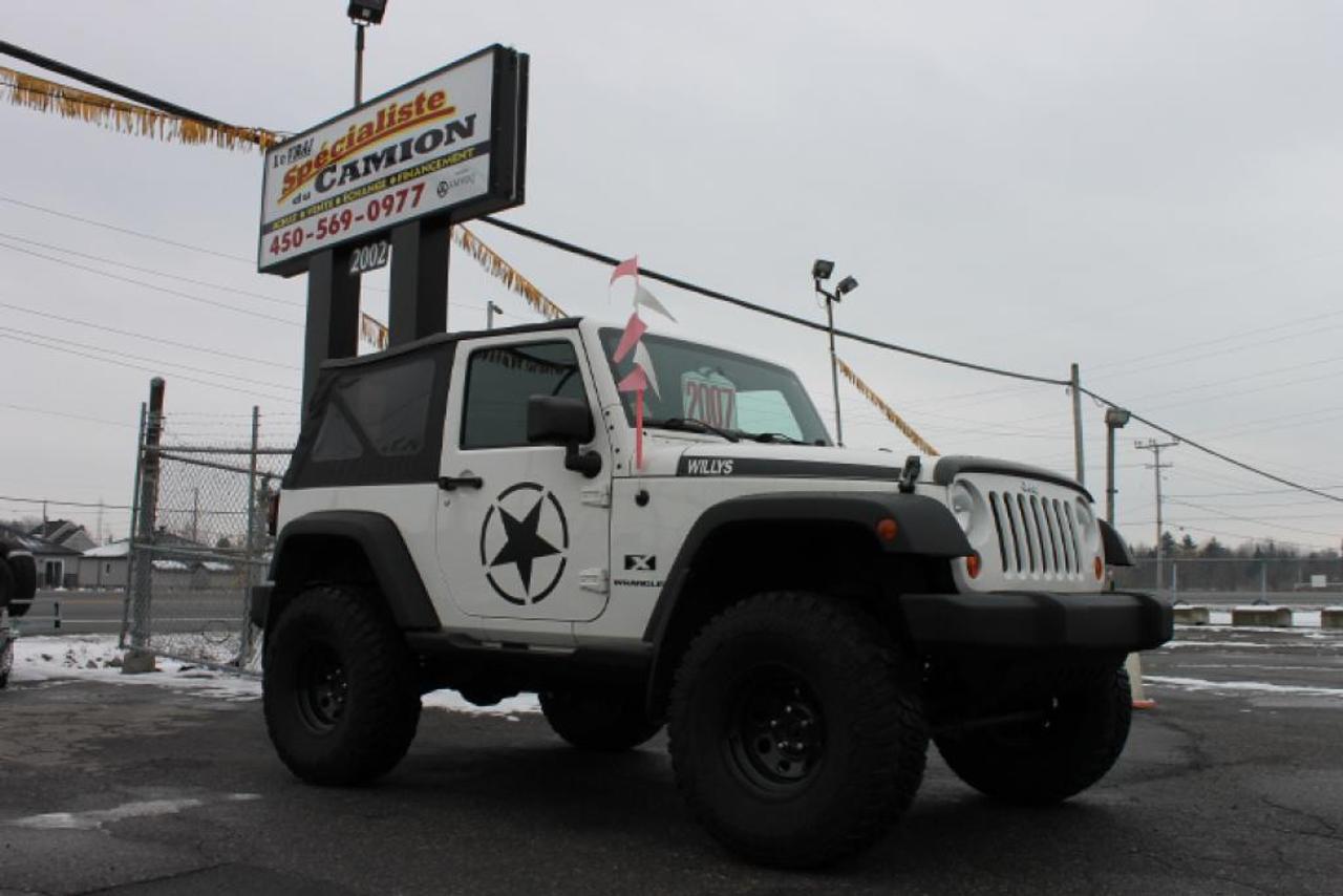 <a href=https://www.autoaubaine.com/Jeep-Wrangler-c6966545.html>https://www.autoaubaine.com/Jeep-Wrangler-c6966545.html</a>

***WOW!!! SUPERBE JEEP WRANGLER V6 MANUEL 2007! En parfaite état mécanique et esthétique. Bas kilométrage. 3.8L, 2 portes, AM/FM/CD/AUX,toit mou, marchepieds, 4 pneus neufs 35x12.50R15LT Mud Trac + roue de secours, suspension surélevée (lift kit). Jamais accidenté! Possibilité de toit dur pour 500$!!! Ne le manquez pas chez Le Vrai Spécialiste du Camion!!!***Tous nos camions sont INSPECTÉS, CERTIFIÉS ET GARANTIS ; voilà notre force chez Le Vrai Spécialiste du Camion. Nous payons le MAXIMUM pour votre ÉCHANGE. Financement disponible  Nous offrons 1ère ,2e, 3e chance au crédit. Échange accepté. CARPROOF sur demande. Nous offrons un service à la clientèle PERSONNALISÉ et des véhicules de QUALITÉ au meilleur prix. OUVERT DU LUNDI AU SAMEDI. Visitez et voir plus de photos sur notre site Internet : www.specialisteducamion.ca