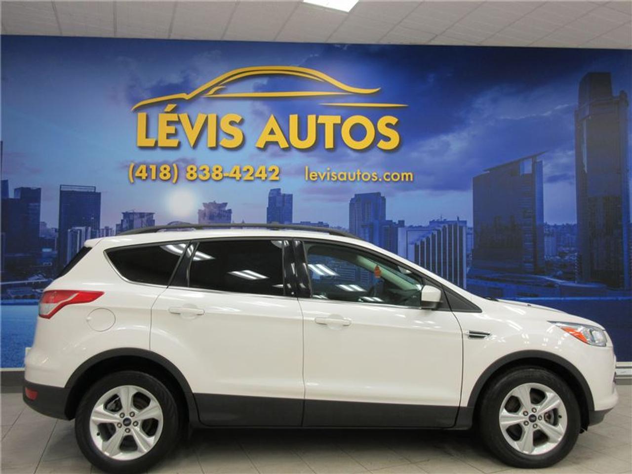 <a href=https://www.autoaubaine.com/Ford-Escape-c7026336.html>https://www.autoaubaine.com/Ford-Escape-c7026336.html</a>

FORD ESCAPE 2014 SE AWD 2.0 LITRES ÉCOBOOST AVEC SEULEMENT 83500 KM CERTIFIÉ ET NAYANT JAMAIS ÉTÉ ACCIDENTÉ (UNIQUE PROPRIÉTAIRE,RAPPORT CARPROOF DISPONIBLE) MOTEUR 2.0 LITRES ÉCOBOOST DEXCELLENTE RÉPUTATION OFFRANT UNE TRÈS BONNE PUISSANCE TOUT EN ÉTANT DURABLE ET ÉCONOMIQUE. TRANSMISSION AUTOMATIQUE AVEC LE MODE SHIFTRONIC À 6 VITESSES, MAGS 17 POUCES SUR PNEUS DÉTÉ, INTÉRIEUR EN TISSU CHAUFFANT+ÉLECTRIQUE, CAMÉRA DE RECUL, ATTACHE-REMORQUE, PHARES ANTI-BROUILLARD, ORDINATEUR DE BORD, COMMANDE AU VOLANT, AIR-CLIMATISÉ, CRUISE CONTROL, SYSTÈME SYNC À ÉCRAN TACTILE AVEC LECTEUR CD MP3 AVEC PRISE AUXILIAIRE/USB/SIRIUS+CAMÉRA DE RECUL, GROUPE ÉLECTRIQUE COMPLET, VOLANT AJUSTABLE ET TÉLESCOPIQUE, RPM, FREIN ABS, TÉLÉ-VERROUILLAGE, ALARME, ANTI-PATINAGE. BALANCE DE GARANTIE FORD DE 5 ANS OU 100000 KM MOTOPROPULSEUR FINISSANT LE 28 FÉVRIER 2019 (GARANTIE PROLONGÉ DISPONIBLE À PRIX IMBATTABLE AVEC LE CAA ET PPP) TAUX DE FINANCEMENT À PARTIR DE SEULEMENT 4.69%. VÉHICULE EXTRÊMEMENT PROPRE ET BIEN ENTRETENUE À VOIR ABSOLUMENT! POUR PLUS DINFOS CELL:418-554-7565/418-838-4242. NOUS SOMMES SITUÉ AU 4585 BOULEVARD GUILLAUME-COUTURE LÉVIS G6W-6M6.LE PLUS GRAND CHOIX DE VÉHICULES USAGÉS À LÉVIS. AU PLAISIR DE VOUS SERVIR! VISITEZ NOTRE SITE INTERNET WWW.LEVISAUTOS.COM
