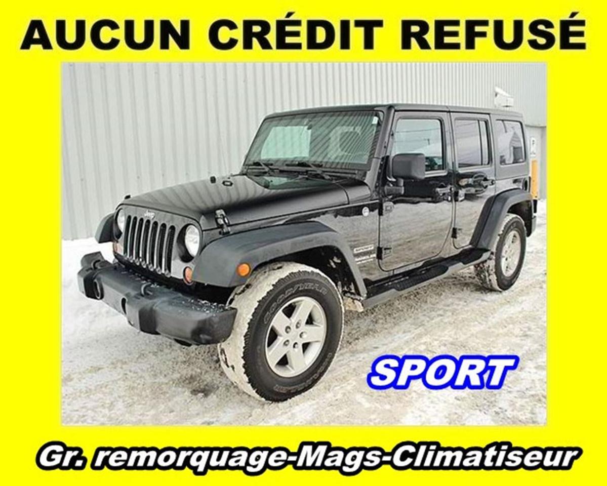<a href=https://www.stjeromechrysler.com/occasion/Jeep-Wrangler-2013.html>https://www.stjeromechrysler.com/occasion/Jeep-Wrangler-2013.html</a>

**Version Sport Unlimited    **Toit amovible    **Jantes aluminium    **Ensemble remorquage    **Marche-pied    **Climatiseur    **Régulateur de vitesse    **Et beaucoup plus!            **ENGLISH DESCRIPTION BELOW**        **RAPPORT DHISTORIQUE + DINSPECTION CERTIFIÉ    **OFFERT POUR UNE DURÉE LIMITÉE    **PROGRAMME 100% APPROUVÉ UNIQUE + FINANCEMENT FACILE    **APPROBATION EN 10 MINUTES / 250 PLANS DE FINANCEMENT DISPONIBLES    **PRÊT POUR LIVRAISON IMMÉDIATE    **JUSQUÀ 2000$ DE PLUS POUR VOTRE ÉCHANGE. NOUS VOULONS LACHETER!    **LIVRAISON PARTOUT AU QUÉBEC ET AU CANADA    **INFORMEZ-VOUS! + DE 500 AUTRES VÉHICULES ET CAMIONS DOCCASION SUR PLACE. PLUS DE 6000 DISPONIBLES SUR DEMANDE.        **Version Sport Unlimited    **Removable sunroof    **Aluminium Mags    **Towing assembly    **Running board    **A/C clean system    **Cruise control    **And much more!        **CARPROOF + INSPECTION CERTIFIED REPORT    **LIMITED OFFER    **100% APPROVED CREDIT PROGRAM / EASY FINANCING    **10 MINUTES APPROVAL / 250 FINANCING PLANS    **READY FOR INSTANT DELIVERY    **UP TO $2000 MORE FOR YOUR TRADE-IN. WE WANT IT!    **DELIVERY EVERYWHERE IN QUEBEC AND CANADA    **CONTACT US! MORE THAN 500 OTHER CARS, SUV AND TRUCKS AVAILABLE.        Nos conseillers certifiés et professionnels sauront vous offrir une expérience dachat personnalisée et conviviale pour lachat de votre nouveau véhicule. Certains accessoires additionnels en sus. Bien que nous ayons pris toutes les mesures raisonnables pour nous assurer de la précision des renseignements fournis, nous ne sommes pas responsables de toute erreur ou omission. Veuillez contre-vérifier les renseignements auprès de lun de nos experts. Dans le cas où un véhicule publié contiendrait des renseignements inexacts à cause dune erreur typographique, photographique, sur le prix ou autre, le concessionnaire se réserve le droit de refuser ou dannuler toute demande. Contactez-nous aussi pour en savoir plus sur nos rabais additionnels en concession.