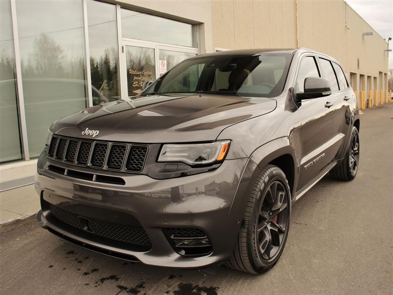 <a href=https://www.stjeromechrysler.com/occasion/Jeep-Grand_Cherokee-2017.html>https://www.stjeromechrysler.com/occasion/Jeep-Grand_Cherokee-2017.html</a>

**Le moins cher au Québec et Ontario!  **Disponible 7 jours seulement (liquidation)  **V8 SRT HEMI 6.4L  **Edition LAGUNA  **4X4 All-Terrain SRT  **Toit ouvrant PANORAMIQUE  **Système de navigation  **Roues de 20 po Dark Edition  **Freins haute-performance BREMBO  **Sièges chauffants avant et arrière  **Sièges ventilés  **Sièges en cuir NAPPA RED avec suède  **Ensemble de remorquage MAX  **Système audio ALPINE 19 haut-parleurs  **Feux DEL haute-performance  **Centre Multimédia UConnect / Écran tactile 8.4 po  **Et beaucoup plus!    **WE SPEAK ENGLISH TOO! SO DONT HESITATE TO CALL US OR TO COME SEE US    **OFFERT POUR UNE DURÉE LIMITÉE  **PROGRAMME EXCLUSIF 100% APPROUVÉ / AUCUN CRÉDIT REFUSÉ  **PRÊT POUR LIVRAISON IMMÉDIATE  **OUVERT DU LUNDI AU SAMEDI  **GARANTIE JUSQUÀ 5 ANS OU 100 000 KM (À PARTIR DE LA DATE DE MISE EN SERVICE)  **ON REPREND TOUT EN ÉCHANGE : AUTO, CAMION, VTT, MOTONEIGE, MOTO, BATEAU, VR ET PLUS!   **JUSQUÀ 35% DE PLUS POUR VOTRE ÉCHANGE  **LIVRAISON PARTOUT AU QUÉBEC ET AU CANADA  **INFORMEZ-VOUS! + DE 700 AUTRES VÉHICULES NEUFS ET DOCCASION DISPONIBLES    **Best price in Quebec and Ontario  **Available 7 days only  **V8 SRT HEMI 6.4L  **LAGUNA Edition  **4X4 All-Terrain SRT  **Dual-panel PANORAMIC sunroof  **Navigation system  **20-inch wheels Dark edition  **BREMBO high-performance brakes  **Heated front and back seats  **Ventilated seats  **NAPPA RED leather seats w/ suede  **Class-IV towing package  **ALPINE audio system / 19 speakers  **DEL high-performance lights  **UConnect Multimedia Center / 8.4-inch touch screen  **And much more!    **LIMITED OFFER  **100% APPROVED CREDIT EXCLUSIVE PROGRAM / NO CREDIT REFUSAL  **READY FOR INSTANT DELIVERY  **OPEN MONDAY TO SATURDAY  **5 YEARS / 100 000 KM LIMITED WARRANTY (FROM THE ENTRY SERVICE DATE)  **ALL TRADE-IN ACCEPTED: AUTO, TRUCK, ATV, SNOWMOBILE, MOTORCYCLE, BOAT, RV AND MORE!   **DELIVERY EVERYWHERE IN QUEBEC AND CANADA  **CONTACT US! MORE THAN 700 OTHER NEW AND PRE-OWNED VEHICLES AVAILABLE.    Nos conseillers certifiés et professionnels sauront vous offrir une expérience dachat personnalisée et conviviale pour lachat de votre nouveau véhicule. Tous les rabais FCA inclus. Certains accessoires additionnels en sus. Bien que nous ayons pris toutes les mesures raisonnables pour nous assurer de la précision des renseignements fournis, nous ne sommes pas responsables de toute erreur ou omission. Veuillez contre-vérifier les renseignements auprès de lun de nos experts. Dans le cas où un véhicule publié contiendrait des renseignements inexacts à cause dune erreur typographique, photographique, sur le prix ou autre, le concessionnaire se réserve le droit de refuser ou dannuler toute demande. Contactez-nous aussi pour en savoir plus sur nos rabais additionnels en concession.