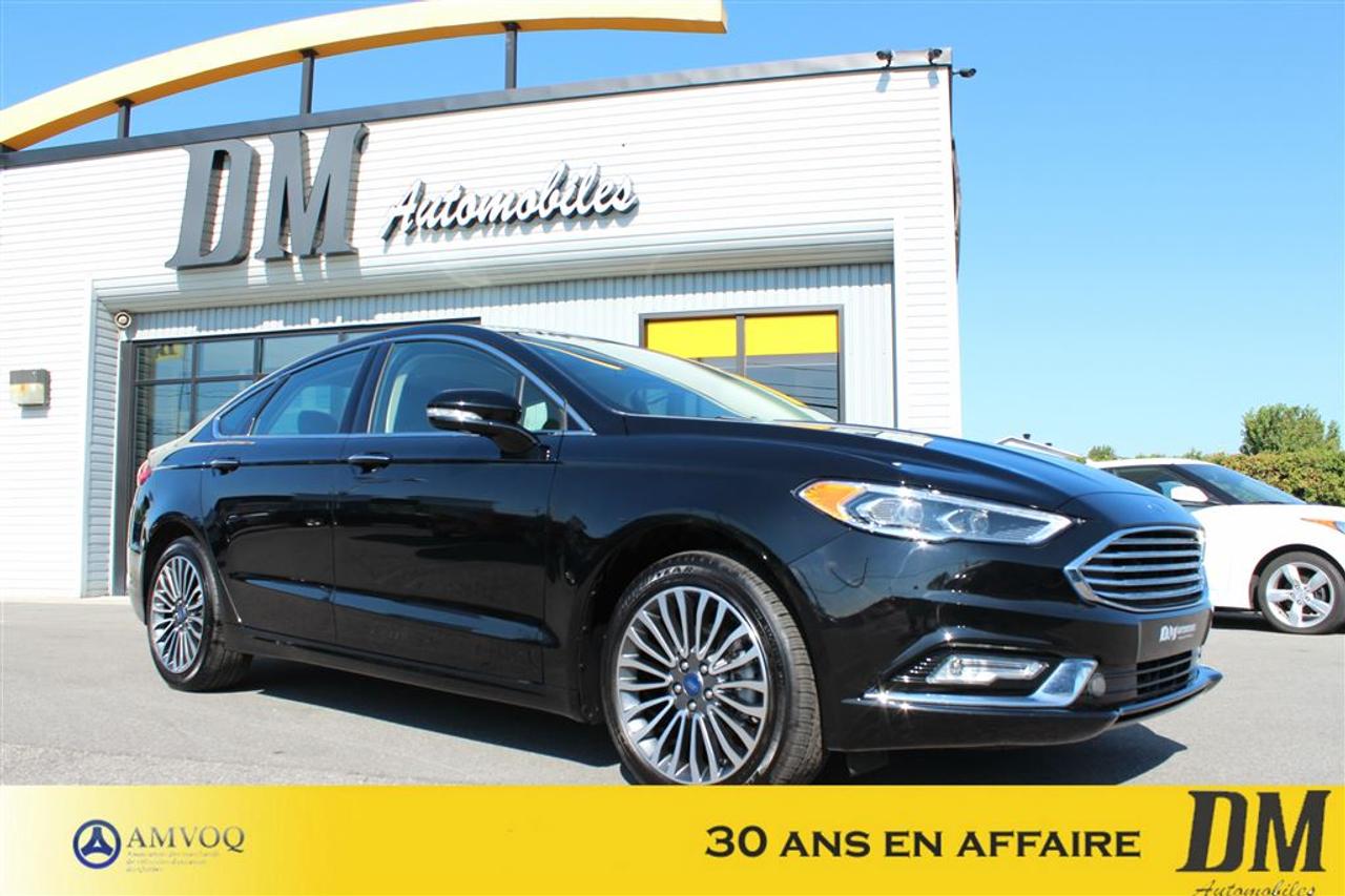 <a href=https://www.dmautos.ca/occasion/Ford-Fusion-2017.html>https://www.dmautos.ca/occasion/Ford-Fusion-2017.html</a>

*** AUCUN FRAIS ADDITIONNEL *** SE AWD, MOTEUR 2.0L TURBO, INTÉRIEUR EN CUIR, TOIT OUVRANT, SYSTÈME DE NAVIGATION, DÉMARREUR À DISTANCE, CAMERA DE RECUL, ENTRÉ ET DÉMARRAGE SANS CLEF, SIÈGES MÉMOIRE ÉLECTRIQUE & CHAUFFANT, BLUETOOTH MAIN LIBRE ET BIEN PLUS ENCORE....Pourquoi choisir DM Automobiles :         - Plus de 29 ans en affaires    - 150 véhicules presque neufs en inventaire    - Rapport CARPROOF    - Financement facile au meilleur taux du marché    - Service après-vente hors pair    - $$$$ Maximum pour votre échange