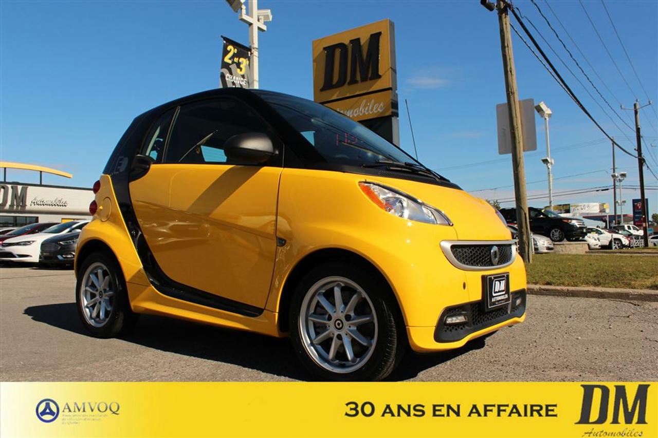 <a href=https://www.dmautos.ca/occasion/Smart-Fortwo-2014.html>https://www.dmautos.ca/occasion/Smart-Fortwo-2014.html</a>

*** AUCUN FRAIS ADDITIONNEL*** NAVIGATION, PASSION ÉLECTRIQUE, TOIT VITRÉ, ENSEMBLE DE MAGS, BANCS CHAUFFANTS, AUTOMATIQUE, VITRES ÉLECTRIQUES, ÉLIGIBLE RABAIS GOUVERNEMENTAL DE 4000$ TX INC. *** EXPIRE 31 MARS 2018 ***CERTAINE CONDITION SAPPLIQUE ET BIEN PLUS ENCORE...Pourquoi choisir DM Automobiles :     - Plus de 29 ans en affaires  - Plus de 150 véhicules de haute qualité en inventaire  - Rapport Carproof  - Financement facile et rapide  - Service après-vente hors pair  - $$$ Maximum pour votre échange $$$