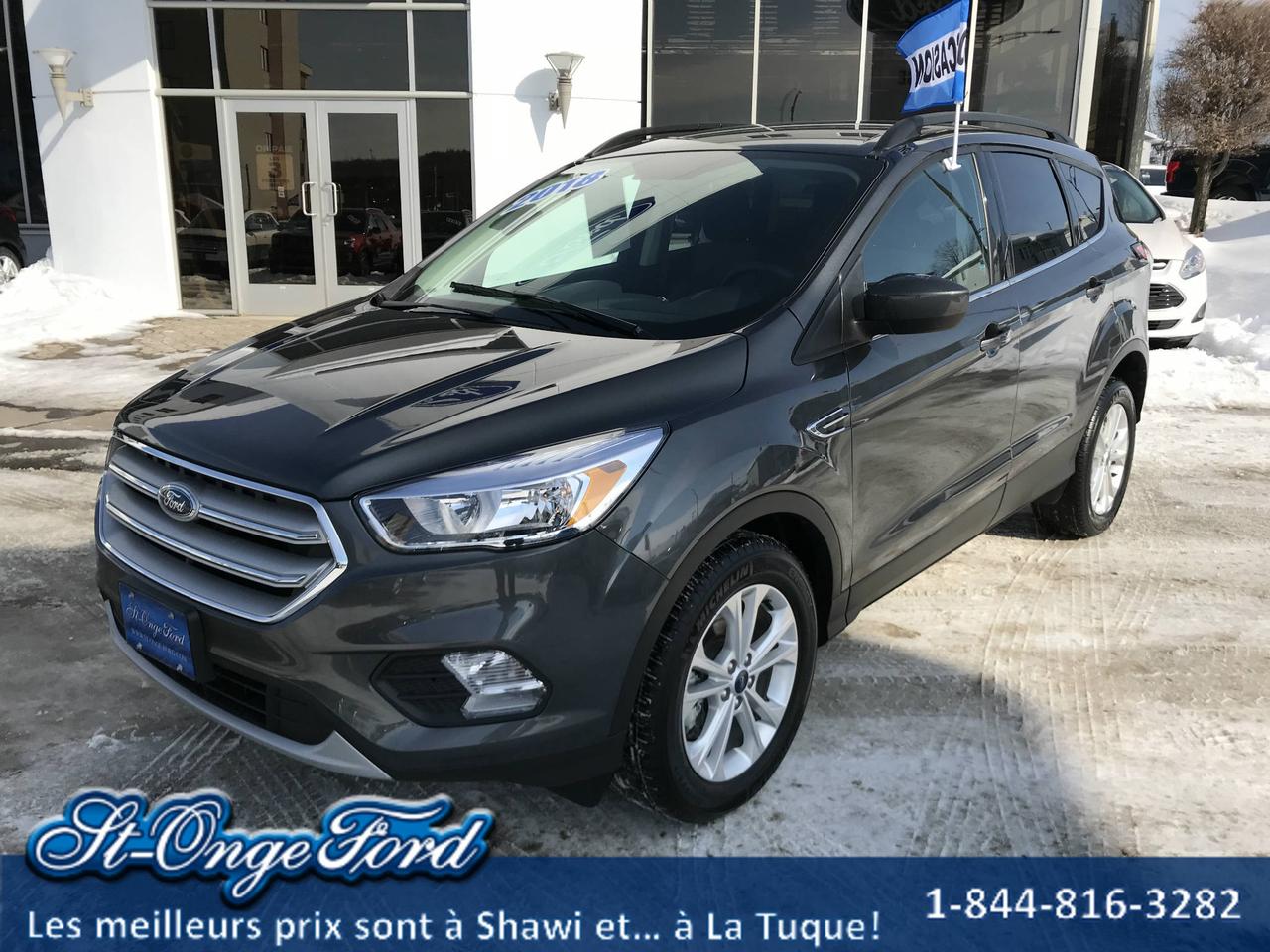 <a href=https://www.groupemondou.com/occasion/Ford-Escape-2018.html>https://www.groupemondou.com/occasion/Ford-Escape-2018.html</a>

***NOUVEL ARRIVAGE***
Caméra de recul, sièges chauffants avant, traction intégrale!! À voir!!

St-Onge Ford (une concession du Groupe Mondou) est un des plus importants concessionnaires de véhicule Ford et doccasion au Québec. Nous offrons un service de livraison GRATUITEMENT partout au Québec ! 

Chef de file en FINANCEMENT automobile et crédit de 1ère 2e et 3e chance, approbation garantie à 100% 

Vous avez un véhicule déchange ? Notre engagement, vous offrir la meilleure valeur sur le marché pour votre véhicule déchange!

Contactez-nous et nous vous ferons une offre imbattable ! 
Les meilleurs prix sont à Shawinigan... et à La Tuque
https://www.st-onge-ford.com/