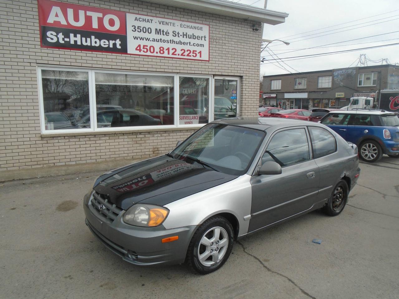 <a href=https://www.autosthubert.com/occasion/Hyundai-Accent-2004.html>https://www.autosthubert.com/occasion/Hyundai-Accent-2004.html</a>

VÉHICULE SITUÉ AU 3500 MONTÉE ST-HUBERT, SAINT-HUBERT, J3Y 4J5, 450.812.2251,
HYUNDAI ACCENT GS 2004 MANUELLE 206 000 KM MOTEUR 4 CYLINDRES 1,6 LITRES TRÈS FIABLE ET ÉCONOMIQUE, VÉHICULE BIEN ÉQUIPÉ LECTEUR CD , BON PNEUS SUR JANTES, SIÈGE ET VOLANT AJUSTABLE, SIÈGE ARRIÈRE RABATTABLE, PORTES GOBELET ET BIEN PLUS UNE OFFRE A NE PAS MANQUÉ !!!  PROFITEZ DE NOTRE FINANCEMENT CLÉ EN MAIN AVEC UN TAUX À PARTIR DE 4.9%. FINANCEMENT MAISON DISPONIBLE APPROUVÉ A 100%, AUCUN CAS REFUSÉ! NOUS OFFRONS LES MEILLEURS PRODUITS DE FINANCEMENT, NOUS AVONS UN APPROVISIONNEMENT EXCLUSIF AUPRÈS DES CONCESSIONNAIRES ET NOUS OFFRONS LES MEILLEURS PRIX DU MARCHÉ ! OUVERT 7 JOURS SEMAINE. POSSIBILITÉ d ÉCHANGE ET PLUS ENCORE ! FINANCEMENT 1RE 2E ET 3E CHANCE AU CRÉDIT WWW.AUTOSTHUBERT.COM POUR VOIR TOUS LES VÉHICULES EN INVENTAIRE. 2 CONCESSIONNAIRES SUR LA RIVE-SUD DE MONTREAL MM 307111