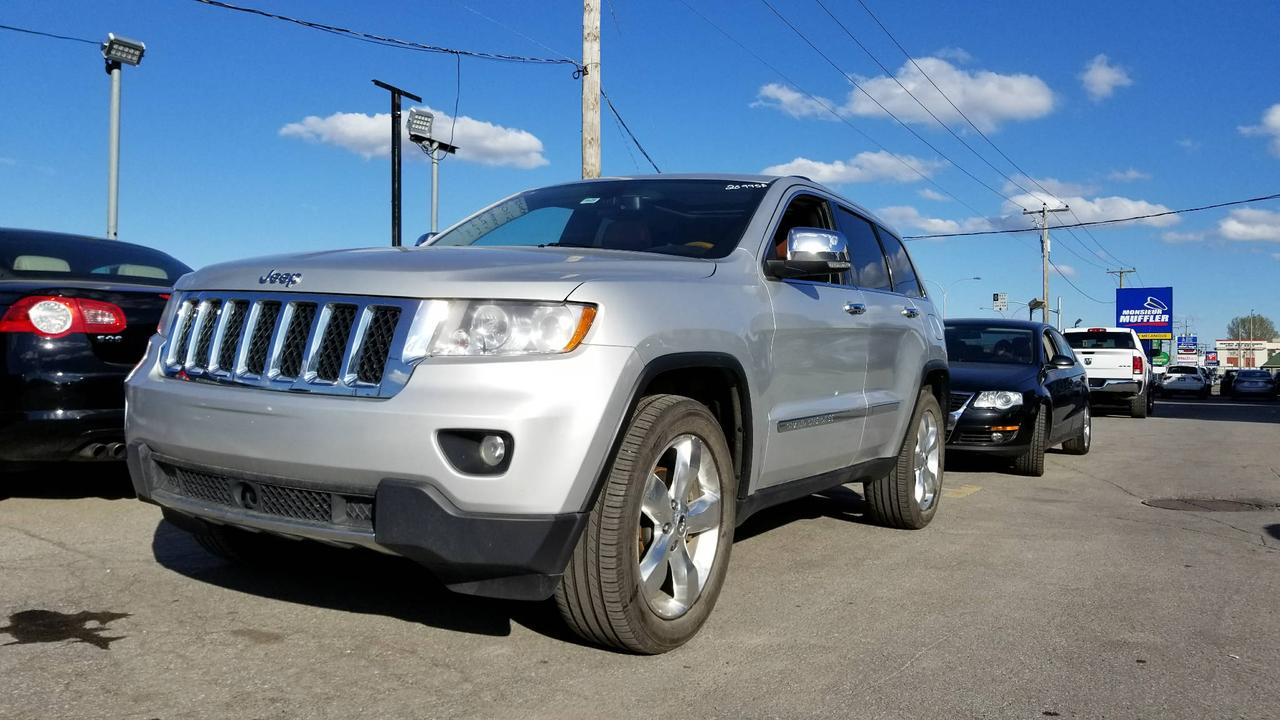 <a href=https://www.autopublique.ca/occasion/Jeep-Grand_Cherokee-2012.html>https://www.autopublique.ca/occasion/Jeep-Grand_Cherokee-2012.html</a>

Jeep Grand Cherokee Overland, 2012, 174,500km, Air climatisé, toit ouvrant panoramique, suspension ajustable, bluetooth, Cuir brun, cruise control, ailon électrique, banc chauffant, tout équipé et encore plus ! 

Auto Publique, en affaires depuis plus de 30 ans vous invite à venir voir notre grande sélection de véhicules certifies avec le rapport carproof!

Notre site situé à Laval vous offre tous les soins requis pour votre nouveau véhicule sous un même toit : Mécanique  à taux réduit si vous achetez un véhicule chez nous, des rabais sur lesthétique ainsi la teinte de vitres, débosselage sans peinture, carrosserie, remplacement de pare-brise et bien plus.

Tous nos véhicules ont un rapport dinspection détaillé, sont soigneusement préparés.

Nous vous offrons le financement 1ère, 2ème et 3ème chance au crédit ainsi que la politique du meilleur prix garanti !

Osez comparer. Avant dacheter venez rencontrer notre personnel dynamique dans un environnement sans pression. Notre mission est de vous trouver le véhicule de votre choix, selon vos critères ! Si nous ne lavons pas, nous pouvons vous le trouver ! Frais de préparation en sus.

Se habla Español !