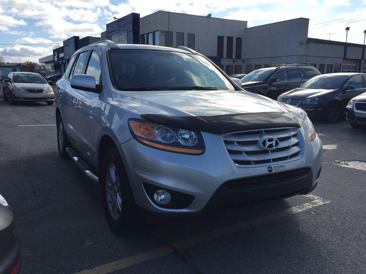 <a href=https://www.autopublique.ca/occasion/Hyundai-Santa_Fe-2011.html>https://www.autopublique.ca/occasion/Hyundai-Santa_Fe-2011.html</a>

Hyundai Santa Fe 2011 avec moins de 120,000km. Bien équipé avec marche-pieds et hitch arrière avec prise 7 pin et brake booster. Portes et fenetres electriques, miroirs electriques, foglights, et deflecteur avant.

Nos sites situés à Laval et Mirabel vous offrent tous les soins requis pour votre nouveau véhicule sous un même toit : Mécanique  à taux réduit si vous achetez un véhicule chez nous, des rabais sur lesthétique ainsi la teinte de vitres, débosselage sans peinture, carrosserie, remplacement de pare-brise et bien plus.

Tous nos véhicules ont un rapport dinspection détaillé, sont soigneusement préparés.

Nous vous offrons le financement 1ère, 2ème et 3ème chance au crédit ainsi que la politique du meilleur prix garanti !
Approbation rapide par notre site web autopublique.ca ou par telephone. 1ere, 2e, 3e chance au credit. Aucun cas refusé. Dépot peut être requis dans certains cas.
Osez comparer. Avant dacheter venez rencontrer notre personnel dynamique dans un environnement sans pression. Notre mission est de vous trouver le véhicule de votre choix, selon vos critères ! Si nous ne lavons pas, nous pouvons vous le trouver ! Frais de préparation en sus
Les deux commerces étant situé sur Cure Labelle, notre accessibilité est facile et rapide.Par lautoroute 440, autoroute 640, autoroute 15 et autoroute 13. Tous les chemins mènent a Auto Publique. Avec vous, sur la route de la vie !

Nous vendons et achetons toutes les marques de vehicules, dont Audi, BMW, Chevrolet, Chrysler, Ford, GM, GMC, Hyundai, Kia, Honda, Fiat, Smart, Mercedes, Mercedes Benz, Toyota, Range Rover, Land Rover, Volvo, Volkswagen, et encore plus.

Se habla Español ! Be calam arabi !