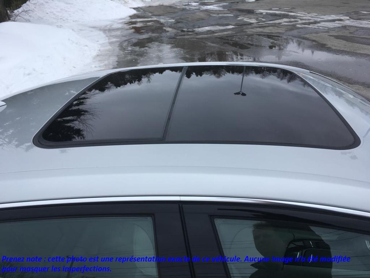 653943.11457199