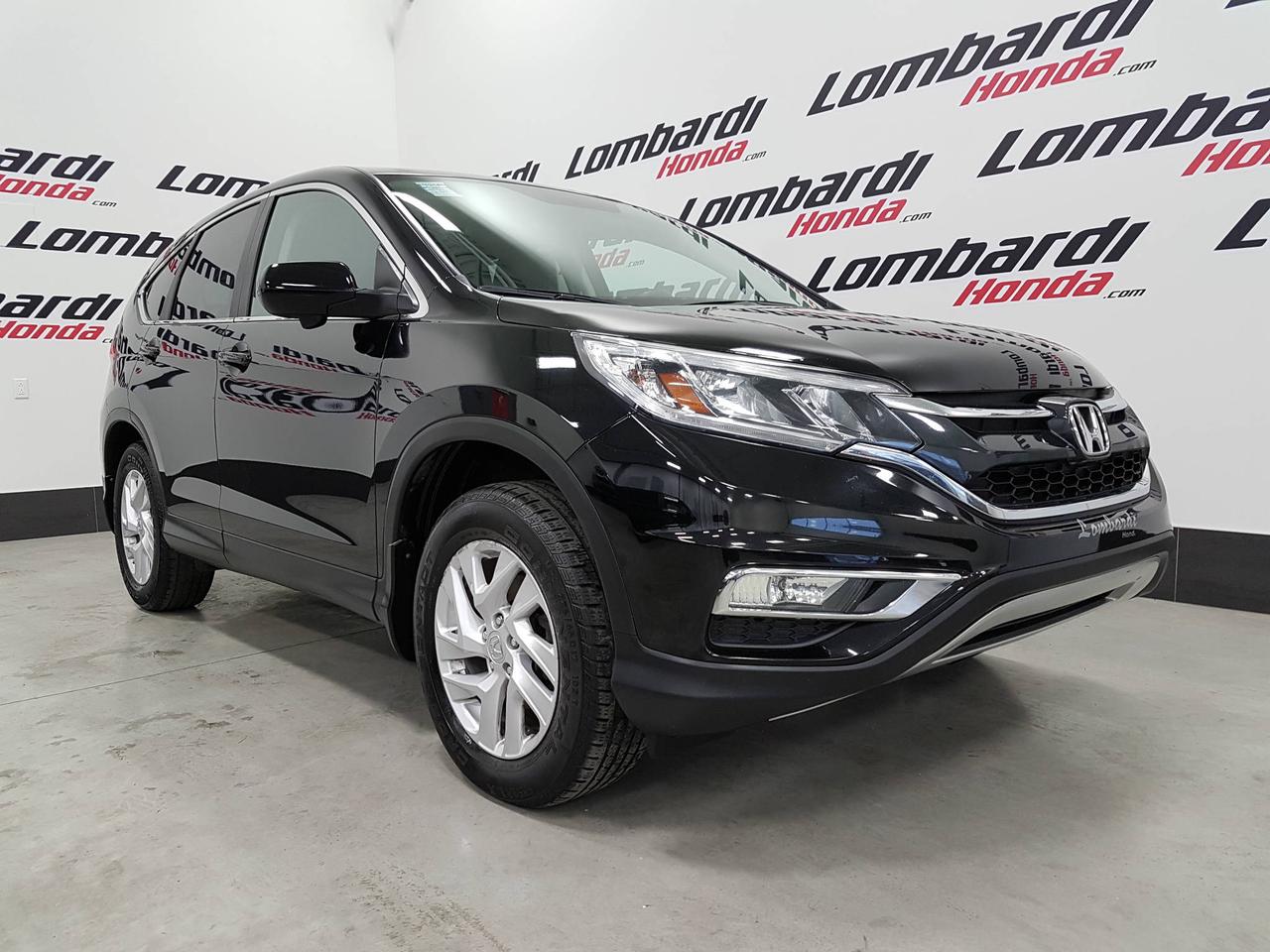 <a href=https://www.lombardihonda.com/occasion/Honda-CRV-2015.html>https://www.lombardihonda.com/occasion/Honda-CRV-2015.html</a>

***EN DESSOUS DU MARCHÉ**

**4X4 **SÉCURITÉ ET CONFORT

Tout le Confort pour vous incluant  *TOIT OUVRANT,BLUETOOTH,CUIR,CAMÉRA DE RECUL**
Lampes de lecture arrière, Commandes audio au volant, Banquette arrière divisé, Climatisation deux zones, Lunette arrière coulissante
Volant ajustable, sièges baquets, Lecteur MP3
Rétroviseurs électriques, Prise Auxiliaire, Prise de courant 400 W (115 V)
Phares automatiques ET des **Tapis protecteurs**

 Ce modèle compte d ailleurs un moteur 2.4L et une transmission automatique offre une variété de caractéristiques.
De plus, la Honda CRV offre un rapport qualité/prix tout simplement exceptionnel sur le marché des véhicules doccasion. 
Les conducteurs dun véhicule Honda, que ce soit une voiture neuve ou doccasion, peuvent compter sur lappui inconditionnel et lexpérience de Lombardi Honda à Montréal près de la Rive-Nord et la Rive-Sud.
Venez dès aujourdhui faire lessai du modèle Honda CRV 2016 doccasion chez votre concessionnaire Lombardi Honda.

VENEZ RENCONTRER NOTRE PERSONNEL ENTIÈREMENT DÉDIÉ A VOTRE SATISFACTION

** ÉCHANGE ACCEPTÉ- ÉVALUATION GRATUITE ET RAPIDE**