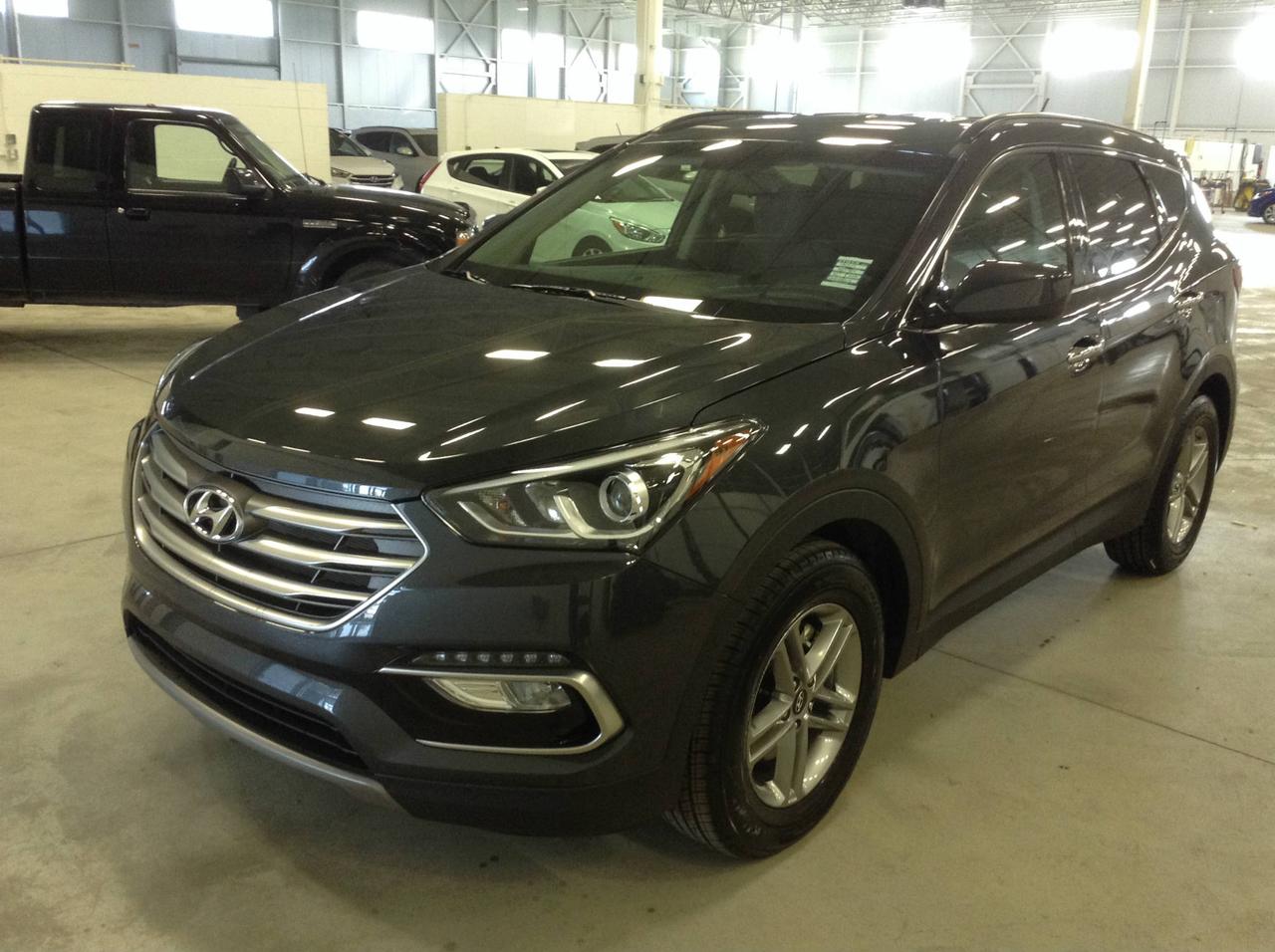 <a href=https://www.hyundailongueuil.com/occasion/Hyundai-Santa_Fe_Sport-2018.html>https://www.hyundailongueuil.com/occasion/Hyundai-Santa_Fe_Sport-2018.html</a>

78$ /sem* , aussi 0% disponible avec autres promotions. Encore mieux sur place. Comparer vos paiements. 
Obtenez les plus petites mensualités. Prix valide du 9 au 16 mars 2018. Comparez les mensualités avantageuse pour un neuf vs les usagées. Transport et préparation, plein dessence,tous frais et rabais inclus.   Visitez notre site pour autres promotions www.hyundailongueuil.com  Toujours mieux sur place.  Obtenez la meilleure transaction comme beaucoup de clients partout au Qu?bec.  Notre but vous offrir la meilleure expérience dachat.  Appelez nous! pour comparez !  Garantie globale 5 ans ou 100 000 km ,  Assistance routière 5 ans ou 100 000 km inclus  Couleur peut différer selon disponibilité. Inclus rabais aux particuliers.   Cette offre est non-combinable avec dautres promotions. 
Jantes de 17 po en alliage
Système téléphonique mains libres Bluetooth® 
Écran tactile de 5,0 po avec caméra de recul
Sièges avant chauffants
Traction intégrale
Ville (boite automatique) 12,0 L/100 km, Autoroute (boite automatique) 9,1 L/100 km, Combinée (boite automatique) 10,7 L /100 km
Moteur 4 cylindres de 2,4 litres à injection directe dessence avec double calage variable des soupapes (D-CVVT)
Boite automatique à 6 rapports avec mode manuel SHIFTRONIC®
Sélection du mode de conduite (Eco, Normal, Sport)
Traction intégrale
7 coussins gonflables : 2 coussins frontaux avant, 2 coussins latéraux intégrés aux dossiers avant, 2 rideaux latéraux intégrés au pavillon avec capteur de renversement et 1 coussin de genoux pour le conducteur
ABS avec répartition électronique de la puissance de freinage
Freins à disque aux quatre roues
Contrôle électronique de la stabilité avec antipatinage
Télédéverrouillage avec alarme
Climatiseur à réglage manuel de la température avec désembueur automatique
Prises d entrée iPod®/USB/Auxiliaire
Système téléphonique mains libres Bluetooth®
Chaine audio AM/FM/CD/MP3 à 6 haut-parleurs, écran tactile de 5 po et caméra de recul
Glace du conducteur à commande électrique à montée/descente automatique avec antipincement
Miroir de courtoisie éclairé aux deux pare-soleils
Surface des sièges en tissu de luxe gris avec protection antitache YES Essentials®
Sièges de 2e rangée rabattables 40/20/40 et inclinables
Soutien lombaire à réglage électrique en 2 directions du côté conducteur
Glaces de custode fortement teintées
Sièges avant chauffants
Volant inclinable et télescopique
Caméra de recul
Commandes de la chaine audio, du système Bluetooth® et du régulateur de vitesse montées au volant
Déflecteur arrière
Rails de toit latéraux
Phares de jour à DEL
Jantes de 17 po en alliage aluminium
Rétroviseurs extérieurs dégivrants à réglage électrique avec minuterie
Phares de type projecteur
Précâblage pour remorquage
Phares automatiques

*Basé sur un financement de 96 mois à 3.97% , obligation totale de 32448$