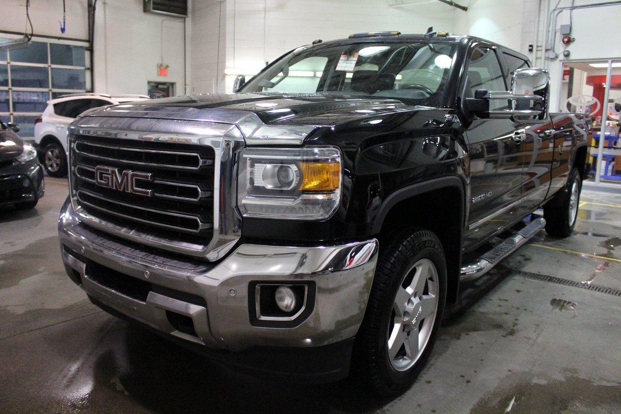 <a href=https://www.autoaubaine.com/GMC-Sierra 2500-c7009999.html>https://www.autoaubaine.com/GMC-Sierra 2500-c7009999.html</a>

GMC 2500 Hd Sierra Z71 4x4 Slt Duramax Boite Longue 2015\n\nRégulateur de vitesse, Toit ouvrant, Anti-démarreur, Freins ABS, Contrôle de stabilité, Coussin gonflable conducteur, Coussins gonflables latéraux, Démarreur à distance, Lecteur CD, Lecteur MP3, 6 Haut-parleurs, Portes électriques, Sièges électriques, Tachymètre, Vitres électriques, Air climatisé, Intérieur en cuir, Climatisation deux zones, Commandes audio au volant, Sièges arrières rabattables, Sièges chauffants, Volant ajustable, Marchepieds, Tapis protecteurs, Vitres teintées, Cabine allongée, Attelage remorque, Ordinateur de bord, Tout équipé, Caméra de recul, Radio AM/FM, Protège-capot, Direction assistée, Télédéverrouillage, Rétroviseurs chauffants, Siège à réglage électrique, Rétroviseurs électriques, Jantes en alliage, Antipatinage, Phares antibrouillards, Prise Auxiliaire, Port USB, Chaise style capitaine, Caisse longue, Climatiseur automatique\n\nGMC SIERRA SLT 2500HD DURAMAX ALLISONON DIESEL 2015 BLUETOOTH, CONTROLES AUDIO AU VOLANT, SYSTEME DE SON BOSE, CABINE DOUBLE SPATIEUSE, BOITE LONGUE, GROUPE ÉLECTRIQUE, CLIMATISEUR DEUX ZONES, RÉGULATEUR DE VITESSE, MIROIRS CHAUFFANT, CAMÉRA DE RECUL, SIÈGES CHAUFFANT ET REFROIDISSANTS, CUIR, JANTES EN ALLIAGE DENALI. JAMAIS ACCIDENTÉ, FICHE DENTRETIEN COMPLÈTE. INSPECTION AVEC RAPPORT DE CONDITION POUR TOUT NOS VÉHICULES USAGÉS. CARPROOF ACCESSIBLE DIRECTEMENT VIA NOS ANNONCES. GARANTIE PROLONGÉE DISPONIBLE. LA MEILLEUR ALLOCATION POUR VOTRE ÉCHANGE. TOUTES LES MARQUES DISPONIBLES. ÉCONOMISEZ PLUS AVEC ST-BASILE TOYOTA, VOTRE CONCESSIONAIRE DE LA RIVE-SUD DE MONTRÉAL. FINANCEMENT FACILE ET CRÉDIT SUR PLACE. 2e CHANCE AU CRÉDIT DISPONIBLE. SITUÉ EN ABORD DE LA ROUTE 116, ENTRE BELOEIL ET ST-BRUNO, VENEZ NOUS VOIR OU VISITEZ LE:  WWW.STBASILETOYOTA.COM