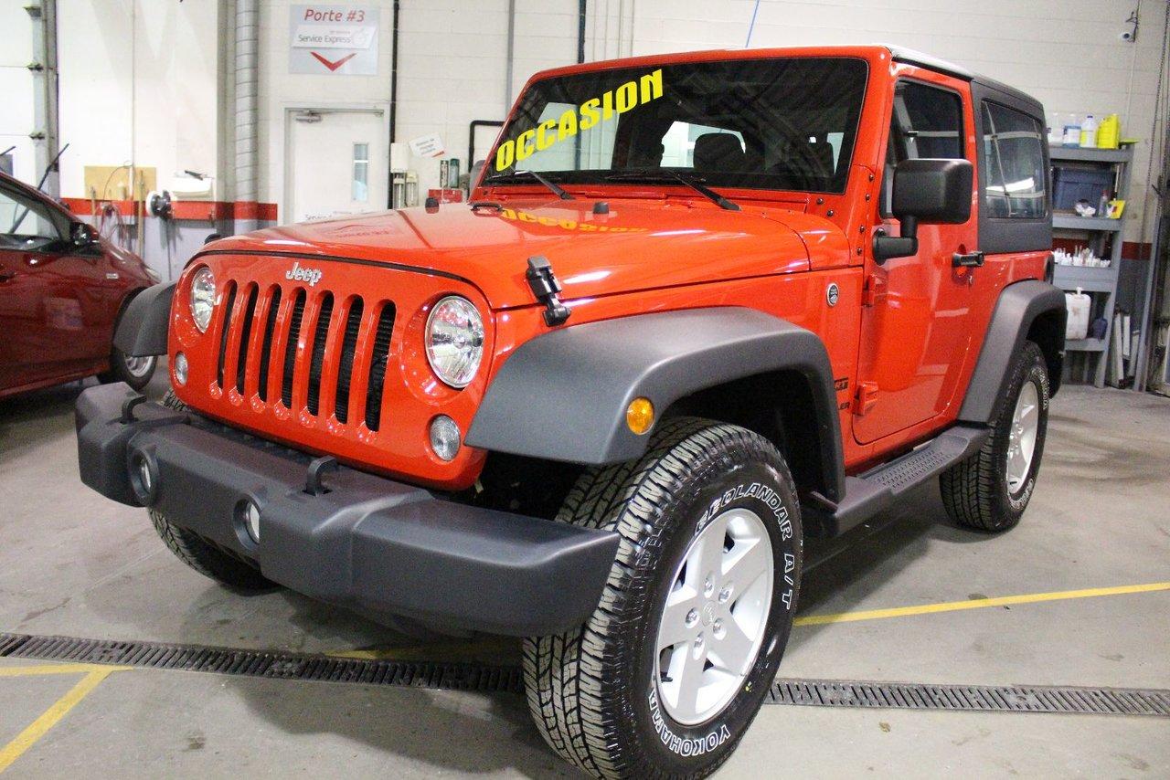 <a href=https://www.autoaubaine.com/Jeep-Wrangler-c7023149.html>https://www.autoaubaine.com/Jeep-Wrangler-c7023149.html</a>

Jeep Wrangler Sport 4x4 Toit Rigide Air Climatisé 2017\n\nRégulateur de vitesse, Essuie-glaces intermittents, Essuie-glace arrière, Anti-démarreur, Freins ABS, Contrôle de stabilité, Coussin gonflable conducteur, Lecteur CD, Lecteur MP3, 6 Haut-parleurs, Tachymètre, Air climatisé, Commandes audio au volant, Sièges arrières rabattables, Volant ajustable, Marchepieds, Tapis protecteurs, Radio AM/FM, Direction assistée, Système de protection au capotage, Freins à disque, Jantes en alliage, Antipatinage, Phares antibrouillards, Système de surveillance de la pression des pneus, Sièges baquets, Prise Auxiliaire, Port USB, Roue de secours - Temporaire\n\nJEEP WRANGLER SPORT 4X4 2017 TOIT RIGIDE, JANTES EN ALLIAGES,CONTROLES AUDIO AU VOLANT, CLIMATISEUR, RÉGULATEUR DE VITESSE. UN SEUL PROPRIÉTAIRE, JAMAIS ACCIDENTÉ, FICHE DENTRETIEN COMPLÈTE. INSPECTION AVEC RAPPORT DE CONDITION POUR TOUT NOS VÉHICULES USAGÉS. CARPROOF ACCESSIBLE DIRECTEMENT VIA NOS ANNONCES. GARANTIE PROLONGÉE DISPONIBLE. LA MEILLEUR ALLOCATION POUR VOTRE ÉCHANGE. TOUTES LES MARQUES DISPONIBLES. ÉCONOMISEZ PLUS AVEC ST-BASILE TOYOTA, VOTRE CONCESSIONAIRE DE LA RIVE-SUD DE MONTRÉAL. FINANCEMENT FACILE ET CRÉDIT SUR PLACE. 2e CHANCE AU CRÉDIT DISPONIBLE. SITUÉ EN ABORD DE LA ROUTE 116, ENTRE BELOEIL ET ST-BRUNO, VENEZ NOUS VOIR OU VISITEZ LE:  WWW.STBASILETOYOTA.COM