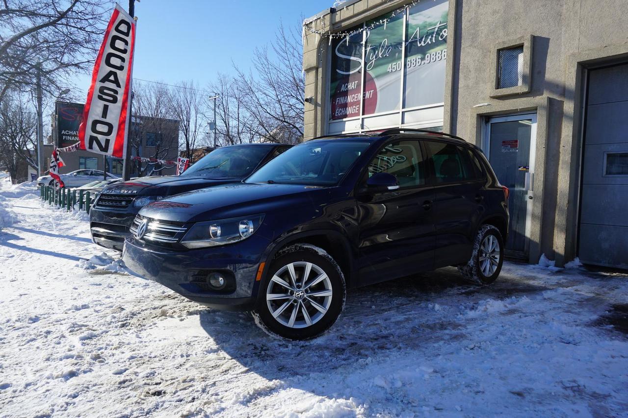 <a href=https://www.styleauto.ca/occasion/Volkswagen-Tiguan-2015.html>https://www.styleauto.ca/occasion/Volkswagen-Tiguan-2015.html</a>

2015 VOLKSWAGEN TIGUAN 4MOTION COMFORLINE PLUS  4cyl 2.0 litres TURBO tout équipé INTÉRIEUR EN CUIR toit ouvrant PANORAMIC technologie BLUETOOTH commandes AUDIO au volant CAMÉRA de recule ECRAN TACTILE sieges CHAUFFANTS groupe électric complet vitres portes mirroirs et régul;ateur de vitesse climatiseur  MAGS 17 POUCES vitres TEINTÉES DÉMAREUR a distance seulement 96000km certifié CARPROOF a  lappui,,,STYLE AUTO EST A VOTRE SERVICE depuis 1992 tous nos véhicules viennes avec un rapport dinspection et une garantie FINANCEMENT MAISON et BANCAIRE débute a 4.99% dintérets pour plus dinfos contacter nous 450-686-9886