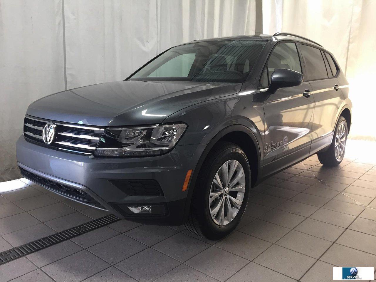 <a href=https://www.autoaubaine.com/Volkswagen-Tiguan-c7017104.html>https://www.autoaubaine.com/Volkswagen-Tiguan-c7017104.html</a>

Volkswagen Tiguan DEMO Trendline  2018Régulateur de vitesse, Essuie-glaces intermittents, Anti-démarreur, Freins ABS, Contrôle de stabilité, Coussin gonflable conducteur, Lecteur CD, Lecteur MP3, Miroirs chauffants, Portes électriques, Vitres électriques, Air climatisé, Commandes audio au volant, Volant ajustable, Aileron, Tapis protecteurs, Ordinateur de bord, Caméra de recul, Radio AM/FM, Direction assistée, Télédéverrouillage, Rétroviseurs électriques, Jantes en alliage, Antipatinage, Coussins gonflables, Verrous de sécurité pour enfants, Système de surveillance de la pression des pneus, Dégivreur de lunette arrière, Sièges baquets, Technologie Bluetooth intégrée