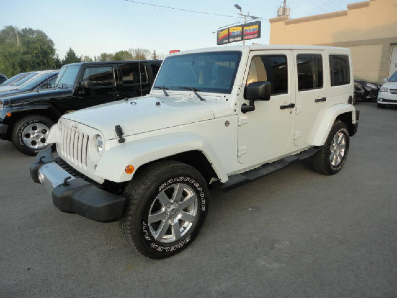 Used 2015 Jeep Wrangler Unlimited-Sahara-Cuir-Navi-DemDist a ven for sale in Laval, QC