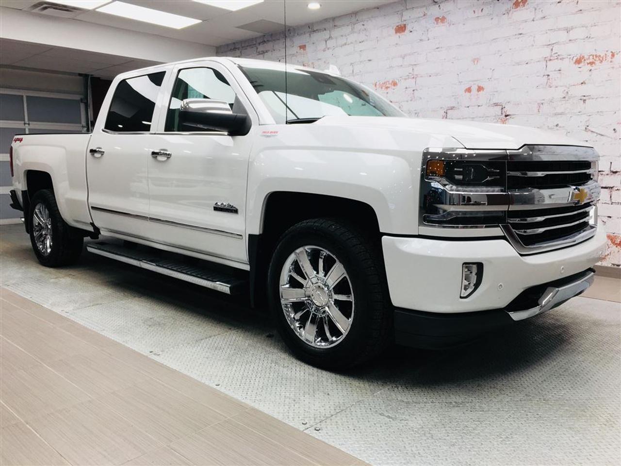 <a href=https://www.2riveschrysler.com/occasion/Chevrolet-Silverado_1500-2017.html>https://www.2riveschrysler.com/occasion/Chevrolet-Silverado_1500-2017.html</a>

***CHEVROLET SILVERADO 1500 HIGH COUNTRY 2017*** LE PLUS BEAU AU MEILLEUR PRIX POINT FINAL!**JAMAIS ACCIDENTÉ** RAPPORT INSPECTION ET CARRPOOF EN MAIN! REPRIS DIRECTEMENT DU CONCESSIONNAIRE! TOUJOURS LE MEILLEUR PRIX! UN SEUL MOT... WOW! UN BIJOUX! TOUT ÉQUIPÉ! BOÎTE DE 6.6 PIEDS! MOTEUR 6.2L! CUIR , NAVIGATION, CAMÉRA DE RECUL, CLIMATISATION BI-ZONE, GROUPE ÉLECTRIQUE, SIÈGES CHAUFFANTS, SIÈGES VENTILÉS ET ENCORE PLUS! UN NEUF AU PRIX DUN USAGÉ! NATTENDEZ PLUS, CONTACTEZ NOUS POUR UN RENDEZ-VOUS!        POUR PRENDRE RENDEZ-VOUS POUR UN ESSAI ROUTIER OU POUR OBTENIR PLUS DE DÉTAILS, VOUS POUVEZ COMMUNIQUER SANS FRAIS AU : 1-877-356-0744 ET VIA TEXTO OU CELLULAIRE AVEC PHILIPPE AU 1450-517-0857 OU SAMUEL AU 1450-780-2709 OU ERIK AU 1514-978-9820 EN TOUT TEMPS, LES SOIRS ET MÊME LE WEEK-END!        TOUJOURS PARMIS LES MOINS CHERS AU CANADA!        Deux Rives Occasion est situé à moins de 45 minutes de Montréal, 30 minutes de Drummondville, St-Hyacinthe, Beloeil!        Votre nouveau véhicule vous sera vendu avec une certification CarProof et une inspection complète.        Rabais de 500$ déjà appliqué sur le prix avec un financement à taux régulier.        Nos reprenons vos véhicules en échange peu importe létat!        Financement disponible sur place; 1ère, 2è et 3è chance au crédit.        Contactez-nous pour prendre rendez-vous et pour faire un essai routier.        À moins de 45 minutes de Montréal, 30 minutes de Drummondville, St-Hyacinthe, Beloeil!        UNE ENTREPRISE FAMILIALE ; EN AFFAIRES DEPUIS PLUS DE 100 ANS        -----------------------------------------------------------------------------------------------------------------------------------        TO GET AN APPOINTMENT FOR A ROAD TEST OR TO HAVE MORE DETAILS, YOU MAY CALL AT: 1-877-356-0744 OR VIA TEXTO OR CELLULAR WITH SAMUEL AU 1450-780-2709 OR PHILIPPE AU 1450-517-0857 OR ERIK AU 1514-978-9820 AT ALL TIMES, EVENINGS AND EVEN THE WEEKEND!         ALWAYS THE BEST DEAL IN CANADA!         Deux Rives Occasion is located less than 45 minutes from Montreal, 30 minutes from Drummondville, St-Hyacinthe, Beloeil!         Your new vehicle will be sold with a CarProof certification and a full inspection.         $ 500 rebate already applied on price with regular rate financing.         We take back your vehicles in exchange regardless of the condition!         Financing available; 1st, 2nd and 3rd chance to credit.         Contact us for an appointment and a test drive.         A FAMILY BUSINESS ; IN BUSINESS FOR OVER 100 YEARS