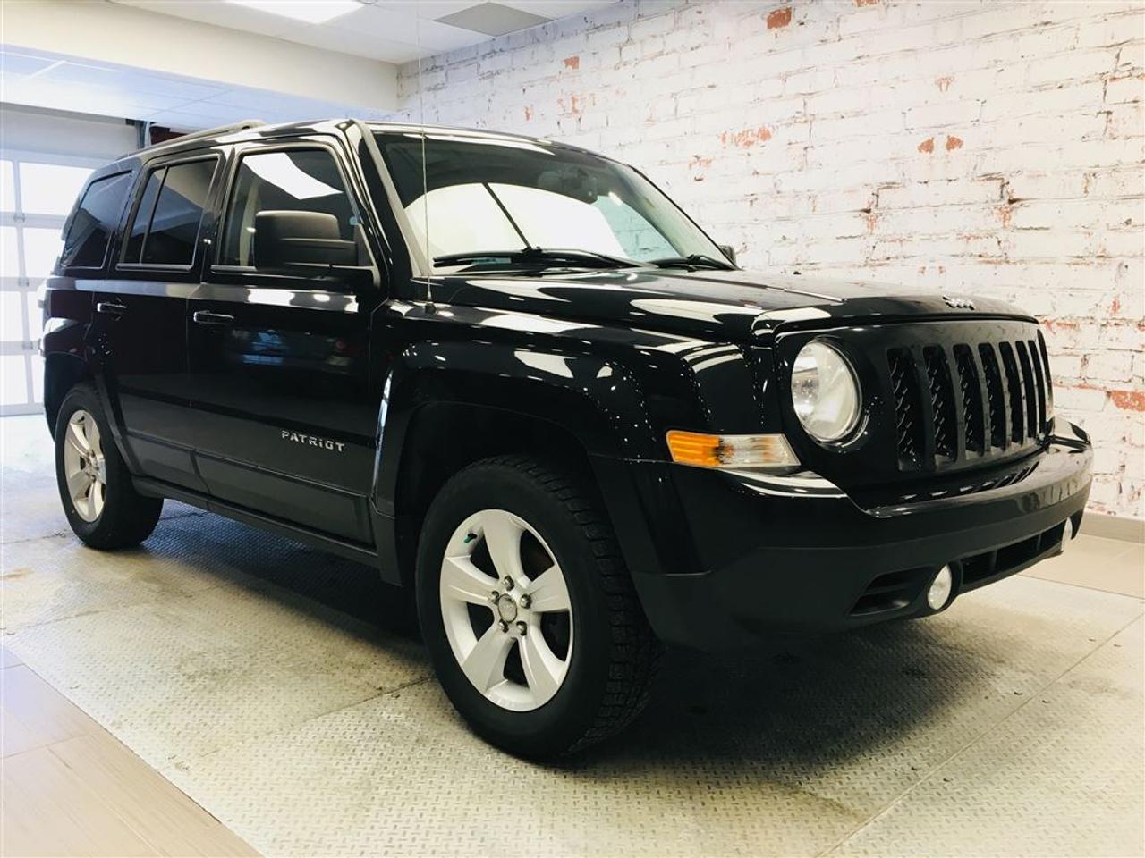 <a href=https://www.2riveschrysler.com/occasion/Jeep-Patriot-2014.html>https://www.2riveschrysler.com/occasion/Jeep-Patriot-2014.html</a>

***JEEP PATRIOT NORTH 2014*** PROPRE! **JAMAIS ACCIDENTÉ** 4X4! LE MOINS CHER SUR LE MARCHÉ! BEAU LOOK! BALANCE DE GARANTIE, MAGS, TOIT OUVRANT, CLIMATISATION, SIÈGES CHAUFFANTS, ATTACHE-REMORQUE, COMMANDES AU VOLANT, BLUETOOTH ET PLUS ENCORE! À VOIR SANS HÉSITER! LE LUXE DAVOIR UN VUS À PETIT PRIX! À VOIR!    POUR PRENDRE RENDEZ-VOUS POUR UN ESSAI ROUTIER OU POUR OBTENIR PLUS DE DÉTAILS, VOUS POUVEZ COMMUNIQUER SANS FRAIS AU : 1-877-356-0744 ET VIA TEXTO OU CELLULAIRE AVEC PHILIPPE AU 1450-517-0857 OU SAMUEL AU 1450-780-2709 EN TOUT TEMPS, LES SOIRS ET MÊME LE WEEK-END!  TOUJOURS PARMIS LES MOINS CHERS AU CANADA!  Deux Rives Occasion est situé à moins de 45 minutes de Montréal, 30 minutes de Drummondville, St-Hyacinthe, Beloeil!  Votre nouveau véhicule vous sera vendu avec une certification CarProof et une inspection complète.  Rabais de 500$ déjà appliqué sur le prix avec un financement à taux régulier.  Nos reprenons vos véhicules en échange peu importe létat!  Financement disponible sur place; 1ère, 2è et 3è chance au crédit.  Contactez-nous pour prendre rendez-vous et pour faire un essai routier.  À moins de 45 minutes de Montréal, 30 minutes de Drummondville, St-Hyacinthe, Beloeil!  UNE ENTREPRISE FAMILIALE ; EN AFFAIRES DEPUIS PLUS DE 100 ANS  -----------------------------------------------------------------------------------------------------------------------------------  TO GET AN APPOINTMENT FOR A ROAD TEST OR TO HAVE MORE DETAILS, YOU MAY CALL AT: 1-877-356-0744 OR VIA TEXTO OR CELLULAR WITH SAMUEL AU 1450-780-2709 OR PHILIPPE AU 1450-517-0857 AT ALL TIMES, EVENINGS AND EVEN THE WEEKEND!   ALWAYS THE BEST DEAL IN CANADA!   Deux Rives Occasion is located less than 45 minutes from Montreal, 30 minutes from Drummondville, St-Hyacinthe, Beloeil!   Your new vehicle will be sold with a CarProof certification and a full inspection.   $ 500 rebate already applied on price with regular rate financing.   We take back your vehicles in exchange regardless of the condition!   Financing available; 1st, 2nd and 3rd chance to credit.   Contact us for an appointment and a test drive.   A FAMILY BUSINESS ; IN BUSINESS FOR OVER 100 YEARS