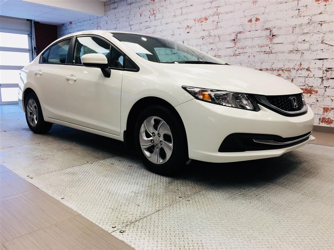 <a href=https://www.2riveschrysler.com/occasion/Honda-Civic-2015.html>https://www.2riveschrysler.com/occasion/Honda-Civic-2015.html</a>

***HONDA CIVIC LX 2015*** TRÈS PROPRE! **JAMAIS ACCIDENTÉ** BIEN ÉQUIPÉ! CLIMATISATION, GROUPE ÉLECTRIQUE, SIÈGES CHAUFFANTS, CAMÉRA DE RECUL, COMMANDES AU VOLANT, RÉGULATEUR DE VITESSE ET PLUSIEURS AUTRES OPTIONS! LA BERLINE LA PLUS FIABLE AU PAYS DEPUIS DES ANNÉES! DEUX RIVES OCCASION, LÀ OÙ ON RETROUVE LES MEILLEURS PRIX! À VOIR!        POUR PRENDRE RENDEZ-VOUS POUR UN ESSAI ROUTIER OU POUR OBTENIR PLUS DE DÉTAILS, VOUS POUVEZ COMMUNIQUER SANS FRAIS AU : 1-877-356-0744 ET VIA TEXTO OU CELLULAIRE AVEC PHILIPPE AU 1450-517-0857 OU SAMUEL AU 1450-780-2709 EN TOUT TEMPS, LES SOIRS ET MÊME LE WEEK-END!        TOUJOURS PARMIS LES MOINS CHERS AU CANADA!        Deux Rives Occasion est situé à moins de 45 minutes de Montréal, 30 minutes de Drummondville, St-Hyacinthe, Beloeil!        Votre nouveau véhicule vous sera vendu avec une certification CarProof et une inspection complète.        Rabais de 500$ déjà appliqué sur le prix avec un financement à taux régulier.        Nos reprenons vos véhicules en échange peu importe létat!        Financement disponible sur place; 1ère, 2è et 3è chance au crédit.        Contactez-nous pour prendre rendez-vous et pour faire un essai routier.        À moins de 45 minutes de Montréal, 30 minutes de Drummondville, St-Hyacinthe, Beloeil!        UNE ENTREPRISE FAMILIALE ; EN AFFAIRES DEPUIS PLUS DE 100 ANS        -----------------------------------------------------------------------------------------------------------------------------------        TO GET AN APPOINTMENT FOR A ROAD TEST OR TO HAVE MORE DETAILS, YOU MAY CALL AT: 1-877-356-0744 OR VIA TEXTO OR CELLULAR WITH SAMUEL AU 1450-780-2709 OR PHILIPPE AU 1450-517-0857 AT ALL TIMES, EVENINGS AND EVEN THE WEEKEND!         ALWAYS THE BEST DEAL IN CANADA!         Deux Rives Occasion is located less than 45 minutes from Montreal, 30 minutes from Drummondville, St-Hyacinthe, Beloeil!         Your new vehicle will be sold with a CarProof certification and a full inspection.         $ 500 rebate already applied on price with regular rate financing.         We take back your vehicles in exchange regardless of the condition!         Financing available; 1st, 2nd and 3rd chance to credit.         Contact us for an appointment and a test drive.         A FAMILY BUSINESS ; IN BUSINESS FOR OVER 100 YEARS