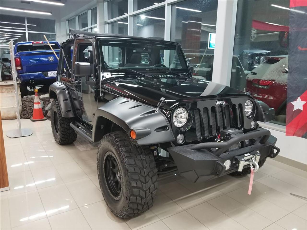 <a href=https://www.2riveschrysler.com/occasion/Jeep-Wrangler-2017.html>https://www.2riveschrysler.com/occasion/Jeep-Wrangler-2017.html</a>

VÉHICULE NEUF    WOW !!!!!! 10 977$ DE MODIFICATIONS     MAG - PNEU - PARE CHOCS- TREUIL - SUSPENSION - MARCHE PIEDS     FAIT ICI EN CONCESSION AVEC DES PIÈCES DE 1ERE QUALITÉ        POUR PRENDRE RENDEZ-VOUS POUR UN ESSAI ROUTIER OU POUR OBTENIR PLUS DE DÉTAILS, VOUS POUVEZ COMMUNIQUER SANS FRAIS AU : 1 (866) 635-1654 ET VIA TEXTO OU CELLULAIRE AVEC JIMMY 450-421-4099 EN TOUT TEMPS, LES SOIRS ET MÊME LE WEEK-END!         TOUJOURS PARMI LES MOINS CHERS AU CANADA!        Occasion Deux Rives est situé à moins de 45 minutes de Montréal, 30 minutes de Drummondville, St-Hyacinthe, Beloeil!        Votre nouveau véhicule vous sera vendu avec une certification CarProof et une inspection complète.        Rabais de 500$ appliqué sur le prix avec un financement à taux régulier.        Nos reprenons vos véhicules en échange peu importe létat!         Financement disponible sur place; 1ere, 2e et 3e chance au crédit.        Contactez-nous pour prendre rendez-vous et faire un essai routier.        UNE ENTREPRISE FAMILIALE ; EN AFFAIRES DEPUIS PLUS DE 100 ANS        -----------------------------------------------------------------------------------------------------------------------------------        TO GET AN APPOINTMENT FOR A ROAD TEST OR TO HAVE MORE DETAILS, YOU MAY CALL AT: 1 (866) 635-1654 OR VIA TEXTO OR CELLULAR WITH JIMMY 450-421-4099 AT ALL TIMES, EVENINGS AND EVEN THE WEEKEND!         ALWAYS THE BEST DEAL IN CANADA!         Occasion Deux Rives is located less than 45 minutes from Montreal, 30 minutes from Drummondville, St-Hyacinthe, Beloeil!         Your new vehicle will be sold with a CarProof certification and a full inspection.         $ 500 rebate applied on price with regular rate financing.         We take back your vehicles in exchange regardless of the condition!         Financing available; 1st, 2nd and 3rd chance to credit.         Contact us for an appointment and a test drive. A FAMILY BUSINESS ;         IN BUSINESS FOR OVER 100 YEARS