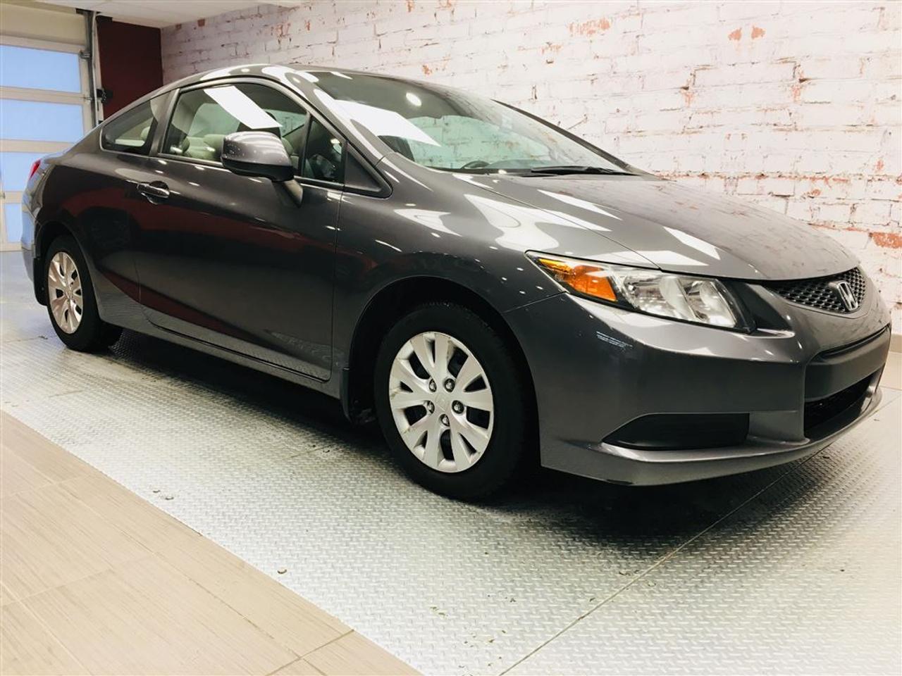<a href=https://www.2riveschrysler.com/occasion/Honda-Civic-2012.html>https://www.2riveschrysler.com/occasion/Honda-Civic-2012.html</a>

***HONDA CIVIC LX 2012*** TRÈS PROPRE! **JAMAIS ACCIDENTÉ** TRÈS ÉCONOMIQUE! COMMANDES AU VOLANT, CLIMATISATION, BLUETOOTH, GROUPE ÉLECTRIQUE ET PLUSIEURS AUTRE OPTIONS! IDÉAL COMME PREMIER VÉHICULE! À VOIR!    POUR PRENDRE RENDEZ-VOUS POUR UN ESSAI ROUTIER OU POUR OBTENIR PLUS DE DÉTAILS, VOUS POUVEZ COMMUNIQUER SANS FRAIS AU : 1-877-356-0744 ET VIA TEXTO OU CELLULAIRE AVEC SAMUEL AU 1450-780-2709 OU PHILIPPE AU 1450-517-0857 EN TOUT TEMPS, LES SOIRS ET MÊME LE WEEK-END!    TOUJOURS PARMIS LES MOINS CHERS AU CANADA!    Deux Rives Occasion est situé à moins de 45 minutes de Montréal, 30 minutes de Drummondville, St-Hyacinthe, Beloeil!    Votre nouveau véhicule vous sera vendu avec une certification CarProof et une inspection complète.    Rabais de 500$ déjà appliqué sur le prix avec un financement à taux régulier.    Nos reprenons vos véhicules en échange peu importe létat!    Financement disponible sur place; 1ère, 2è et 3è chance au crédit.    Contactez-nous pour prendre rendez-vous et pour faire un essai routier.    À moins de 45 minutes de Montréal, 30 minutes de Drummondville, St-Hyacinthe, Beloeil!    UNE ENTREPRISE FAMILIALE ; EN AFFAIRES DEPUIS PLUS DE 100 ANS    -----------------------------------------------------------------------------------------------------------------------------------    TO GET AN APPOINTMENT FOR A ROAD TEST OR TO HAVE MORE DETAILS, YOU MAY CALL AT: 1-877-356-0744 OR VIA TEXTO OR CELLULAR WITH SAMUEL AU 1450-780-2709 OR PHILIPPE AU 1450-517-0857AT ALL TIMES, EVENINGS AND EVEN THE WEEKEND!     ALWAYS THE BEST DEAL IN CANADA!     Deux Rives Occasion is located less than 45 minutes from Montreal, 30 minutes from Drummondville, St-Hyacinthe, Beloeil!     Your new vehicle will be sold with a CarProof certification and a full inspection.     $ 500 rebate already applied on price with regular rate financing.     We take back your vehicles in exchange regardless of the condition!     Financing available; 1st, 2nd and 3rd chance to credit.     Contact us for an appointment and a test drive.     A FAMILY BUSINESS ; IN BUSINESS FOR OVER 100 YEARS