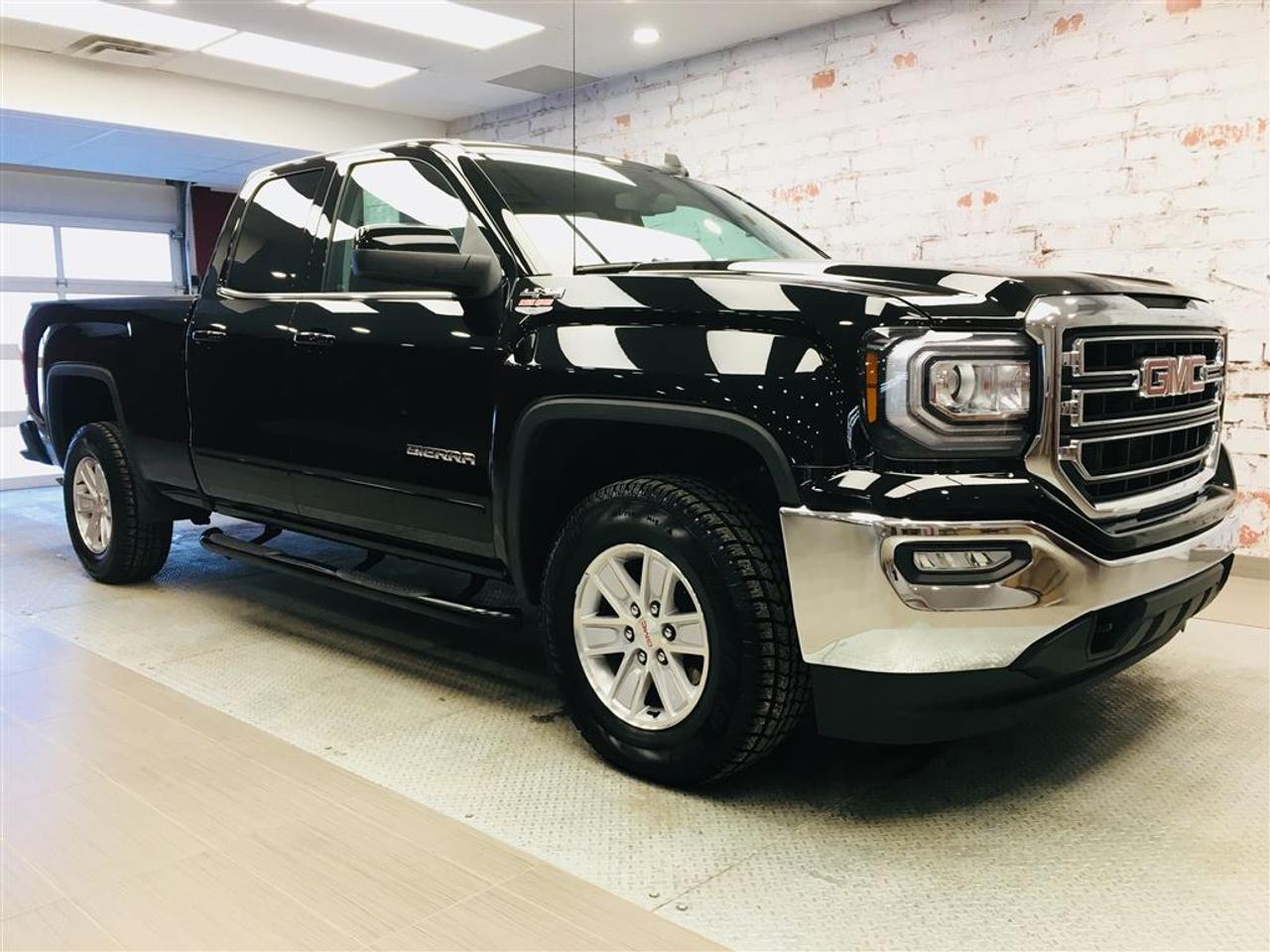 <a href=https://www.2riveschrysler.com/occasion/GMC-Sierra_1500-2017.html>https://www.2riveschrysler.com/occasion/GMC-Sierra_1500-2017.html</a>

***GMC SIERRA SLE 2017*** TRÈS PROPRE! COMME UN NEUF! 4X4! **JAMAIS ACCIDENTÉ** 1 SEUL PROPRIÉTAIRE! QUAD CAB, BOÎTE DE 6.5 PIEDS, MOTEUR 5.3L/V8! GROUPE ÉLECTRIQUE, CAMÉRA DE RECUL, COMMANDES AU VOLANT, BLUETOOTH, RÉGULATEUR DE VITESSE ET PLUS ENCORE! 6 PLACES! TRÈS COMMODES! POURQUOI PAYER PLUS CHER AILLEURS QUAND VOUS AVEZ DÉJÀ LE MEILLEUR PRIX? À VOIR!    POUR PRENDRE RENDEZ-VOUS POUR UN ESSAI ROUTIER OU POUR OBTENIR PLUS DE DÉTAILS, VOUS POUVEZ COMMUNIQUER SANS FRAIS AU : 1-877-356-0744 ET VIA TEXTO OU CELLULAIRE AVEC SAMUEL AU 1450-780-2709 OU PHILIPPE AU 1450-517-0857 EN TOUT TEMPS, LES SOIRS ET MÊME LE WEEK-END!    TOUJOURS PARMIS LES MOINS CHERS AU CANADA!    Deux Rives Occasion est situé à moins de 45 minutes de Montréal, 30 minutes de Drummondville, St-Hyacinthe, Beloeil!    Votre nouveau véhicule vous sera vendu avec une certification CarProof et une inspection complète.    Rabais de 500$ déjà appliqué sur le prix avec un financement à taux régulier.    Nos reprenons vos véhicules en échange peu importe létat!    Financement disponible sur place; 1ère, 2è et 3è chance au crédit.    Contactez-nous pour prendre rendez-vous et pour faire un essai routier.    À moins de 45 minutes de Montréal, 30 minutes de Drummondville, St-Hyacinthe, Beloeil!    UNE ENTREPRISE FAMILIALE ; EN AFFAIRES DEPUIS PLUS DE 100 ANS    -----------------------------------------------------------------------------------------------------------------------------------    TO GET AN APPOINTMENT FOR A ROAD TEST OR TO HAVE MORE DETAILS, YOU MAY CALL AT: 1-877-356-0744 OR VIA TEXTO OR CELLULAR WITH SAMUEL AU 1450-780-2709 OR PHILIPPE AU 1450-517-0857 AT ALL TIMES, EVENINGS AND EVEN THE WEEKEND!   ALWAYS THE BEST DEAL IN CANADA!     Deux Rives Occasion is located less than 45 minutes from Montreal, 30 minutes from Drummondville, St-Hyacinthe, Beloeil!     Your new vehicle will be sold with a CarProof certification and a full inspection.     $ 500 rebate already applied on price with regular rate financing.     We take back your vehicles in exchange regardless of the condition!     Financing available; 1st, 2nd and 3rd chance to credit.     Contact us for an appointment and a test drive.     A FAMILY BUSINESS ; IN BUSINESS FOR OVER 100 YEARS