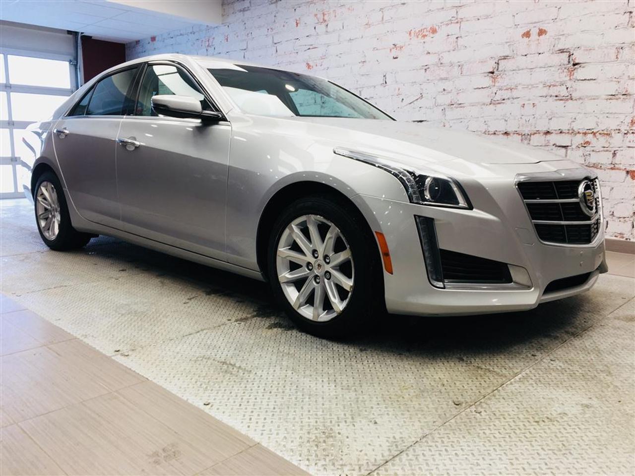 <a href=https://www.2riveschrysler.com/occasion/Cadillac-CTS-2014.html>https://www.2riveschrysler.com/occasion/Cadillac-CTS-2014.html</a>

***CADILLAC CTS4 2.0L TURBO LUXURY 2014*** WOW! UN BIJOUX! TOUT ÉQUIPÉ! **JAMAIS ACCIDENTÉ** AWD - CUIR/TOIT PANORAMIQUE/NAVIGATION/CAMÉRA DE RECUL! GROUPE ÉLECTRIQUE, SIÈGES MÉMOIRE, SIÈGES ET VOLANT CHAUFFANTS, SIÈGES VENTILÉS! PADDLE-SHIFT AU VOLANT POUR UN PEU DAMUSEMENT ET ENCORE PLUS! CONFORT, RAFINNEMENT AU RENDEZ-VOUS! NOUVEL ARRIVAGE! NHÉSITEZ PAS À NOUS CONTACTER POUR PLUS DE DÉTAILS! **TOUJOURS LE MEILLEUR PRIX SUR LE MARCHÉ**    POUR PRENDRE RENDEZ-VOUS POUR UN ESSAI ROUTIER OU POUR OBTENIR PLUS DE DÉTAILS, VOUS POUVEZ COMMUNIQUER SANS FRAIS AU : 1-877-356-0744 ET VIA TEXTO OU CELLULAIRE AVEC PHILIPPE AU 1450-517-0857 OU SAMUEL AU 1450-780-2709 LES SOIRS ET MÊME LE WEEK-END!    TOUJOURS PARMIS LES MOINS CHERS AU CANADA!    Deux Rives Occasion est situé à moins de 45 minutes de Montréal, 30 minutes de Drummondville, St-Hyacinthe, Beloeil!    Votre nouveau véhicule vous sera vendu avec une certification CarProof et une inspection complète.    Rabais de 500$ déjà appliqué sur le prix avec un financement à taux régulier.    Nos reprenons vos véhicules en échange peu importe létat!    Financement disponible sur place; 1ère, 2è et 3è chance au crédit.    Contactez-nous pour prendre rendez-vous et pour faire un essai routier.    À moins de 45 minutes de Montréal, 30 minutes de Drummondville, St-Hyacinthe, Beloeil!    UNE ENTREPRISE FAMILIALE ; EN AFFAIRES DEPUIS PLUS DE 100 ANS    -----------------------------------------------------------------------------------------------------------------------------------    TO GET AN APPOINTMENT FOR A ROAD TEST OR TO HAVE MORE DETAILS, YOU MAY CALL AT: 1-877-356-0744 OR VIA TEXTO OR CELLULAR WITH SAMUEL AU 1450-780-2709 OR PHILIPPE AU 1450-517-0857 AT ALL TIMES, EVENINGS AND EVEN THE WEEKEND!     ALWAYS THE BEST DEAL IN CANADA!     Deux Rives Occasion is located less than 45 minutes from Montreal, 30 minutes from Drummondville, St-Hyacinthe, Beloeil!     Your new vehicle will be sold with a CarProof certification and a full inspection.     $ 500 rebate already applied on price with regular rate financing.     We take back your vehicles in exchange regardless of the condition!     Financing available; 1st, 2nd and 3rd chance to credit.     Contact us for an appointment and a test drive.     A FAMILY BUSINESS ; IN BUSINESS FOR OVER 100 YEARS