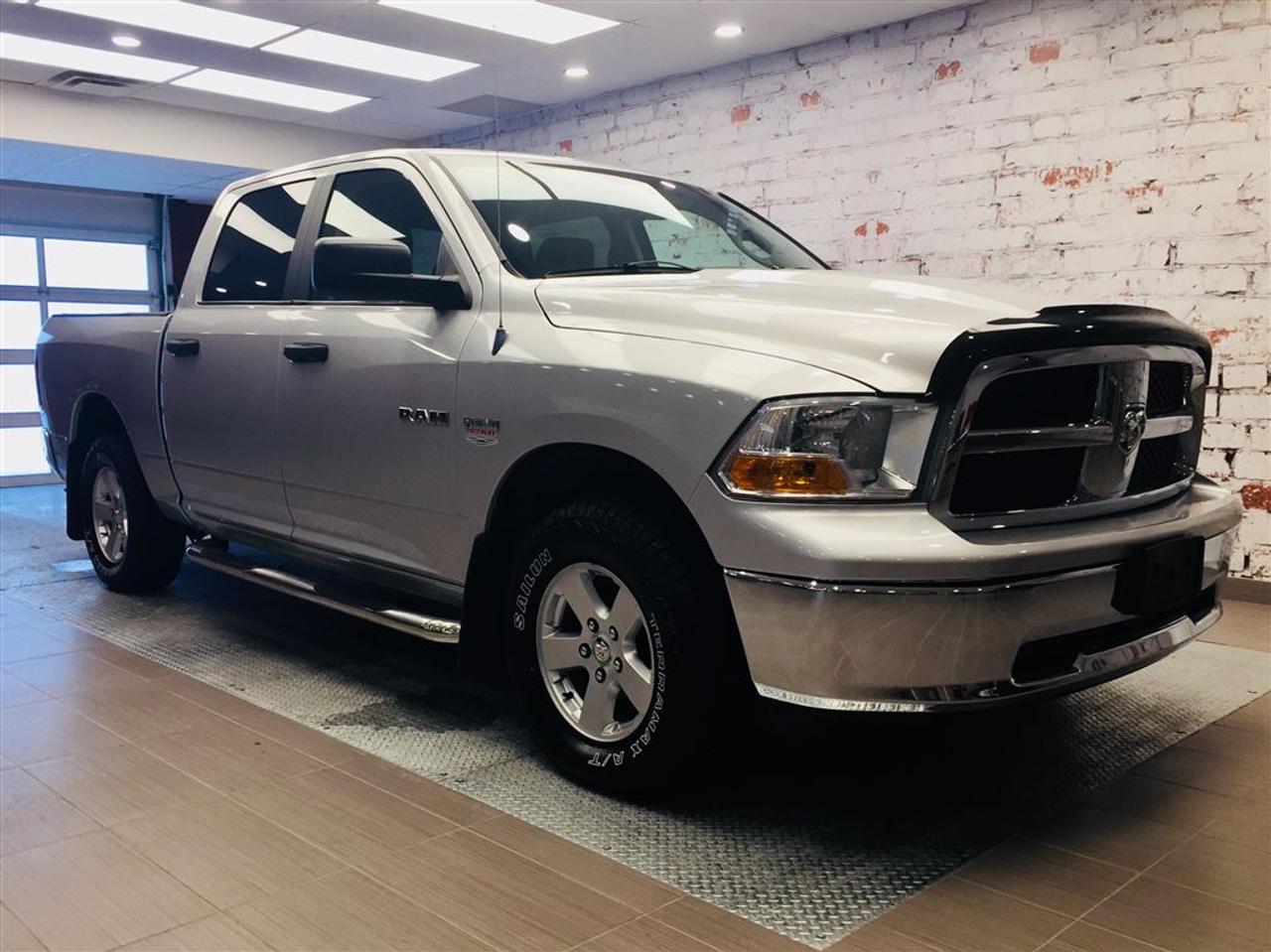<a href=https://www.2riveschrysler.com/occasion/Dodge-RAM_1500-2009.html>https://www.2riveschrysler.com/occasion/Dodge-RAM_1500-2009.html</a>

***DODGE RAM 1500 HEMI SLT 2009*** TRES PROPRE! RAPPORT CARPROOF ET INSPECTION EN MAIN! ; CREW CAB, 4X4 , CLIMATISATION, RÉGULATEUR DE VITESSE, VITRES ÉLECTRIQUES, COMMANDES AU VOLANT, ATTACHE-REMORQUE ET PLUS! CONFORT, PUISSANCE, ESPACE SAURONT VOUS SATISFAIRE! MOTEUR HEMI, BOÎTE DE 5.7 PIEDS! BEAU LOOK! LE CAMION IDÉAL POUR VOS BESOIN ET CE, TOUJOURS AU MEILLEUR PRIX! À SE PROCURER SANS HÉSITER!  POUR PRENDRE RENDEZ-VOUS POUR UN ESSAI ROUTIER OU POUR OBTENIR PLUS DE DÉTAILS, VOUS POUVEZ COMMUNIQUER SANS FRAIS AU : 1-877-356-0744 ET VIA TEXTO OU CELLULAIRE AVEC PHILIPPE AU 1450-517-0857 OU SAMUEL AU 1450-780-2709 EN TOUT TEMPS, LES SOIRS ET MÊME LE WEEK-END!  TOUJOURS PARMIS LES MOINS CHERS AU CANADA!  Deux Rives Occasion est situé à moins de 45 minutes de Montréal, 30 minutes de Drummondville, St-Hyacinthe, Beloeil!  Votre nouveau véhicule vous sera vendu avec une certification CarProof et une inspection complète.  Rabais de 500$ déjà appliqué sur le prix avec un financement à taux régulier.  Nos reprenons vos véhicules en échange peu importe létat!  Financement disponible sur place; 1ère, 2è et 3è chance au crédit.  Contactez-nous pour prendre rendez-vous et pour faire un essai routier.  À moins de 45 minutes de Montréal, 30 minutes de Drummondville, St-Hyacinthe, Beloeil!  UNE ENTREPRISE FAMILIALE ; EN AFFAIRES DEPUIS PLUS DE 100 ANS  -----------------------------------------------------------------------------------------------------------------------------------  TO GET AN APPOINTMENT FOR A ROAD TEST OR TO HAVE MORE DETAILS, YOU MAY CALL AT: 1-877-356-0744 OR VIA TEXTO OR CELLULAR WITH SAMUEL AU 1450-780-2709 OR PHILIPPE AU 1450-517-0857 AT ALL TIMES, EVENINGS AND EVEN THE WEEKEND!   ALWAYS THE BEST DEAL IN CANADA!   Deux Rives Occasion is located less than 45 minutes from Montreal, 30 minutes from Drummondville, St-Hyacinthe, Beloeil!   Your new vehicle will be sold with a CarProof certification and a full inspection.   $ 500 rebate already applied on price with regular rate financing.   We take back your vehicles in exchange regardless of the condition!   Financing available; 1st, 2nd and 3rd chance to credit.   Contact us for an appointment and a test drive.   A FAMILY BUSINESS ; IN BUSINESS FOR OVER 100 YEARS
