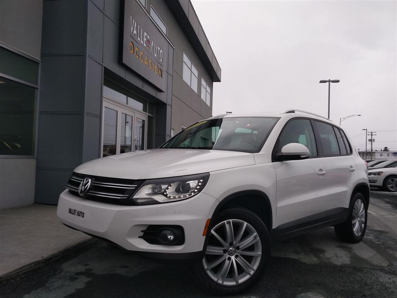 <a href=https://www.valleeauto.com/occasion/Volkswagen-Tiguan-2014.html>https://www.valleeauto.com/occasion/Volkswagen-Tiguan-2014.html</a>

AUCUN FRAIS CACHÉ, AUCUNE SURPRISE, VOUS PAYEZ LE PRIX AFFICHÉ!!!!!  VOLKSWAGEN TIGUAN 4MOTION COMFORTLINE GROUPE SPORT, 2014,JAMAIS ACCIDENTÉ, AUTOMATIQUE ,A/C, mags 18, vitres teintées, intérieur en similicuir, sièges avants chauffants, régulateur de vitesse, Bluetooth, ordinateur de bord, volant ajustable et télescopique multi-fonctions, toit ouvrant panoramique, radio satellite+am/fm, lecteur CD, prise IPod, prise SD, écran tactile, phares à brume, vitres et portes électriques, et bien plus!!!!  Nous sommes concessionnaire Volkswagen depuis 1959 et tous nos véhicules sont inspectés ET réparés par nos techniciens formés par Volkswagen avant la mise en vente. Achetez en toute tranquillité desprit. Livraison partout en province. Financement à taux avantageux sur place!