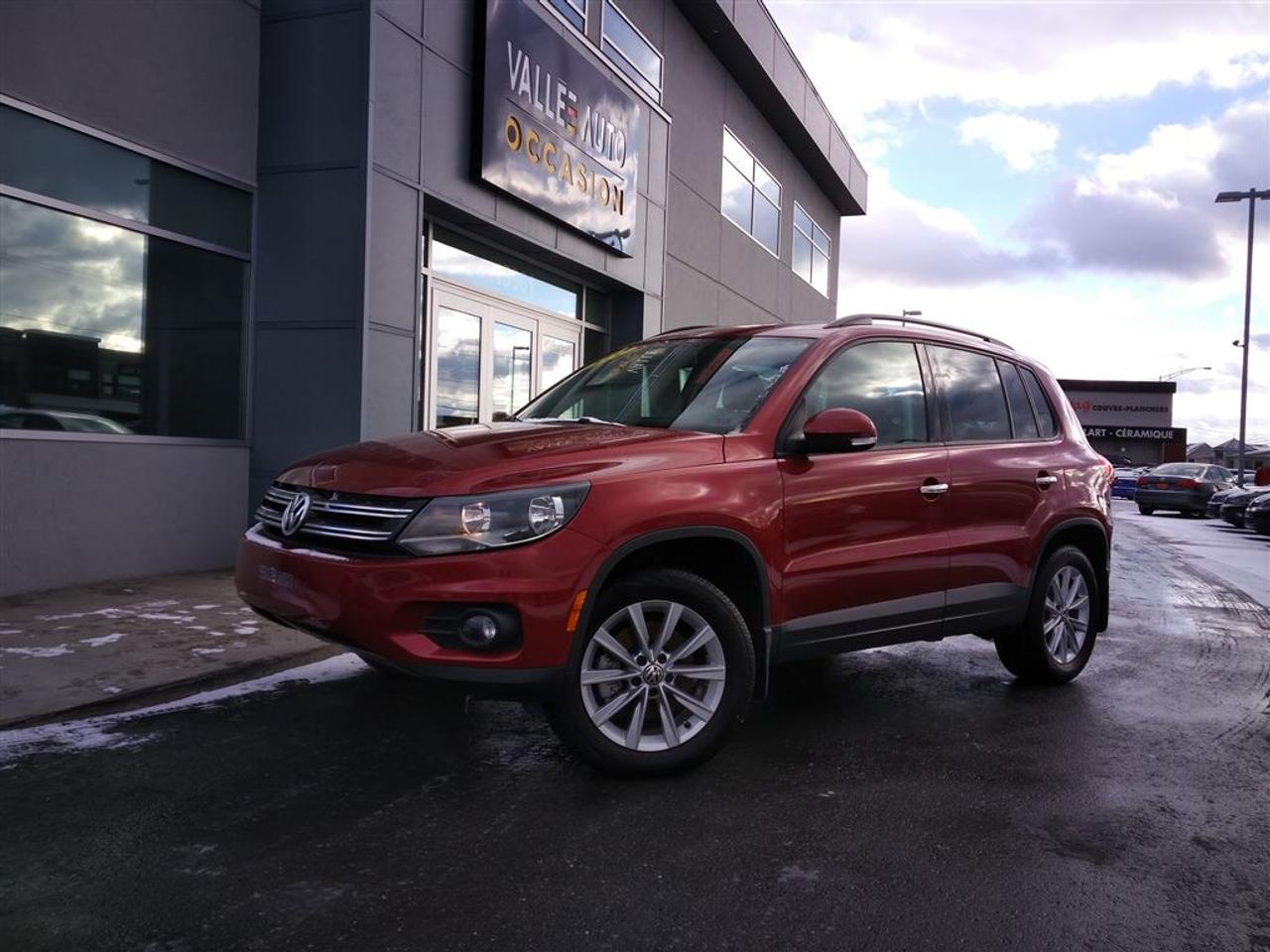 <a href=https://www.valleeauto.com/occasion/Volkswagen-Tiguan-2014.html>https://www.valleeauto.com/occasion/Volkswagen-Tiguan-2014.html</a>

AUCUN FRAIS CACHÉ, AUCUNE SURPRISE, VOUS PAYEZ LE PRIX AFFICHÉ!!!!!  VOLKSWAGEN TIGUAN ComfortLine, 2014, AUTOMATIQUE**Toit panoramique, AWD** JAMAIS ACCIDENTÉ(Rapport CarProof à lappui). A/C, mags 17, vitres teintées, intérieur en similicuir, sièges avants chauffants, cruise control, bluetooth, ordinateur de bord, volant ajustable et télescopique multi-fonctions, toit ouvrant panoramique, radio satellite+am/fm, lecteur CD, prise IPod, prise SD, écran tactile, phares à brume, vitres et portes électriques, et bien plus!!!!  Nous sommes concessionnaire Volkswagen depuis 1959 et tous nos véhicules sont inspectés ET réparés par nos techniciens formés par Volkswagen avant la mise en vente. Le véhicule est éligible à une garantie certifié Pur Volkswagen de 2 ans ou 40,000 km incluant lassistance routière. Achetez en toute tranquillité desprit. Livraison partout en province. Financement à taux avantageux sur place!