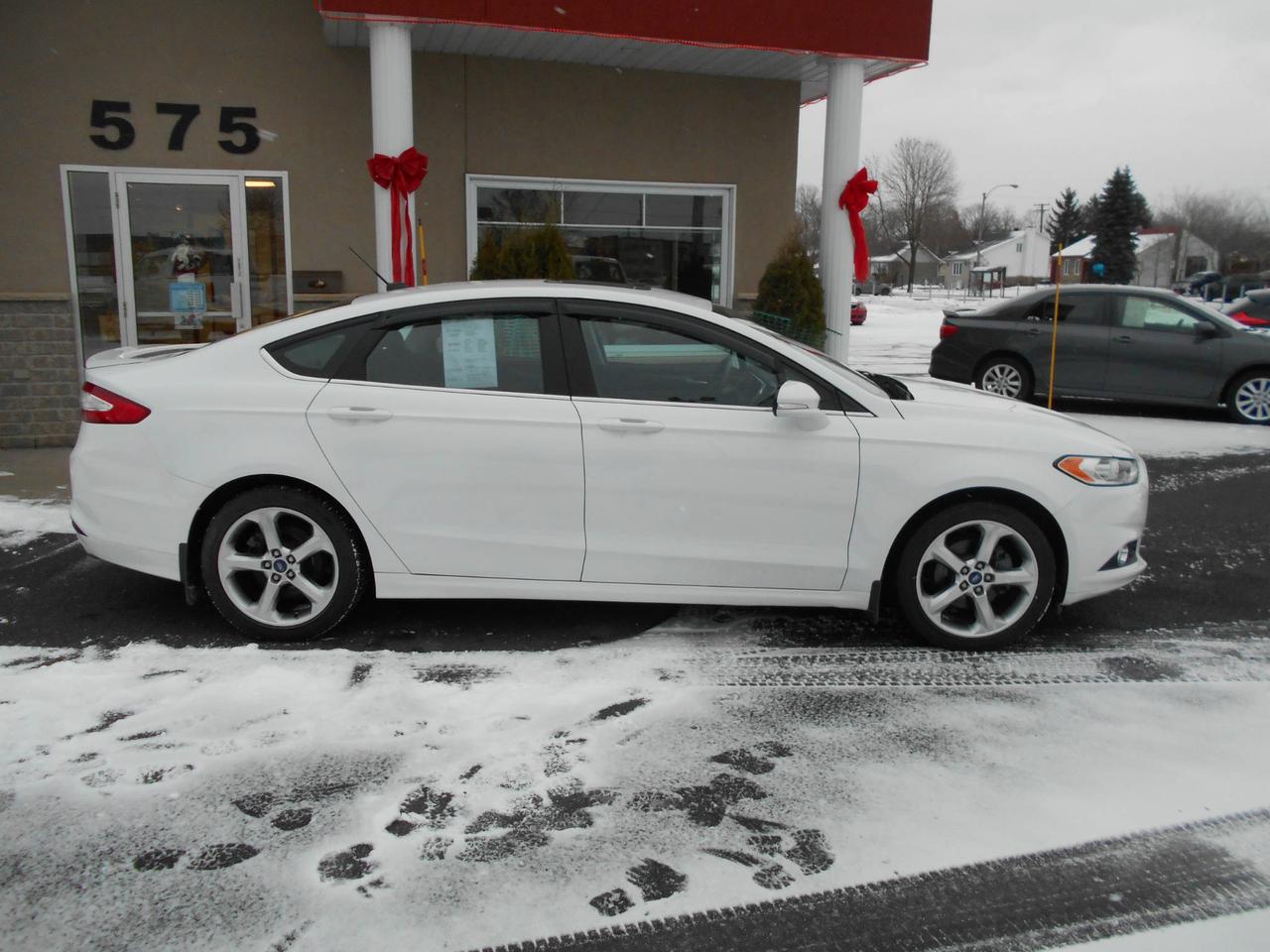 <a href=https://www.dlautos.com/occasion/Ford-Fusion-2013.html>https://www.dlautos.com/occasion/Ford-Fusion-2013.html</a>

FORD FUSION SE 2013 COMPLETEMENT ÉQUIPÉ, TOIT OUVRANT, ROUES MAGS, PHARES ANTI BROUILLARD, AIL ROND ARRIERE, DEMAREUR A DISTANCE, AVEC SEULEMENT 57 000 KM. VOITURE IMPÉCABLE JAMAIS ACCIDENTÉ RAPPORT CAR PROOF INCLUS ET BALANCE DE GARANTIE FORD.