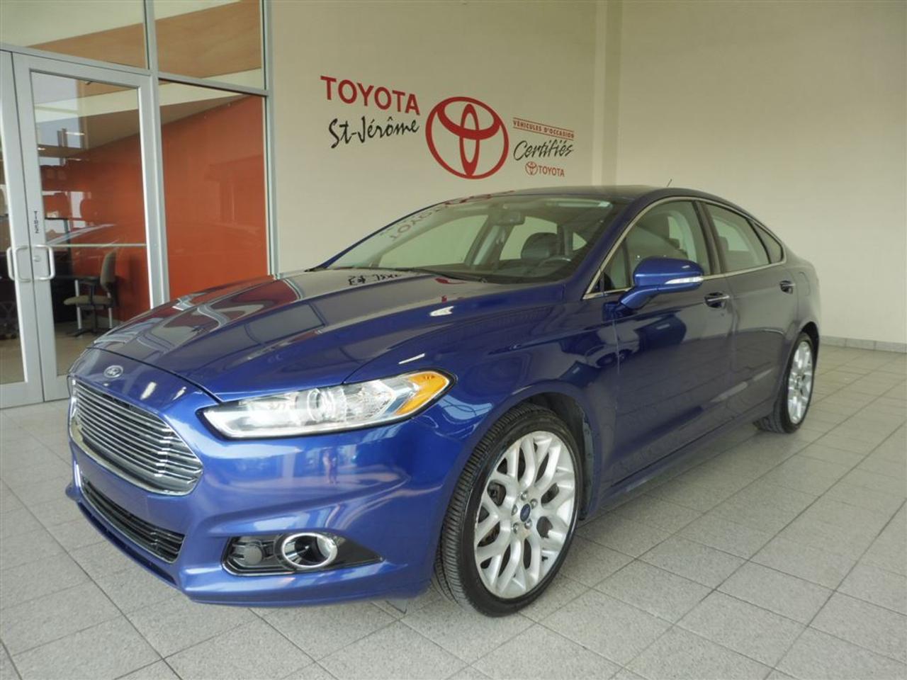 <a href=https://www.toyotastjerome.ca/occasion/Ford-Fusion-2013.html>https://www.toyotastjerome.ca/occasion/Ford-Fusion-2013.html</a>

* Titanium * 4X4 * TOUT ÉQUIPÉ * TOIT * CUIR * NAV * DÉMARREUR * GARANTIE JUSQUEN JUILLET 2020 OU 160000 KMS * EXCELLENTE CONDITION *    ***MEILLEUR PRIX POUR VOTRE VÉHICULE DÉCHANGE ***    *** INSPECTION 127 POINTS EFFECTUÉ PAR NOS TECHNICIENS CERTIFIÉS TOYOTA ***     *** PLUS DE 80 VÉHICULES DOCCASION EN INVENTAIRE, SORTIE 39 DE LAUTOROUTE 15 ***