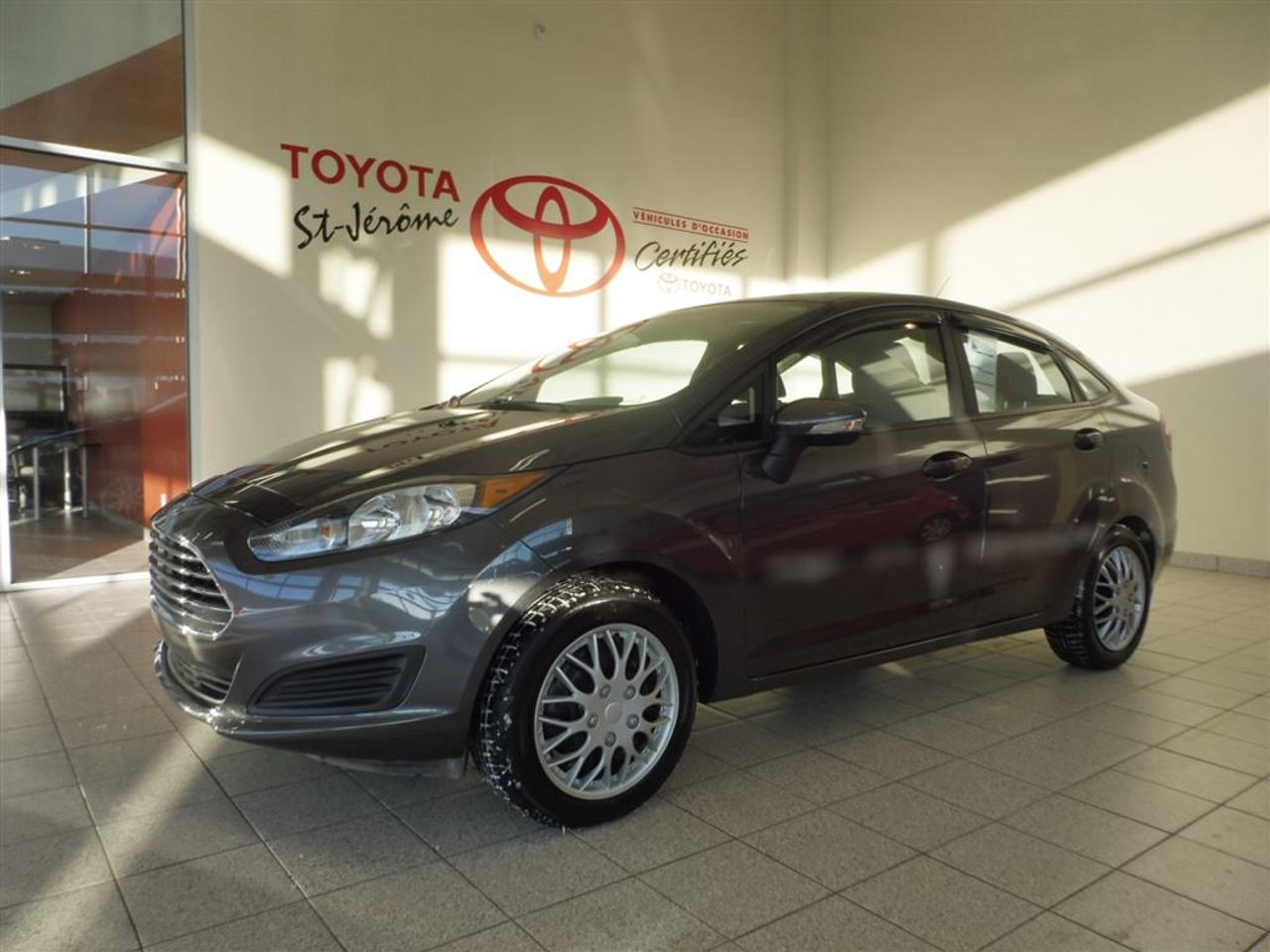 <a href=https://www.toyotastjerome.ca/occasion/Ford-Fiesta-2015.html>https://www.toyotastjerome.ca/occasion/Ford-Fiesta-2015.html</a>

* SE * BLUETOOTH * CRUISE * A/C * SEULEMENT 18 000 KMS *** JAMAIS ACCIDENTÉ *** AUTOMATIQUE  ***MEILLEUR PRIX POUR VOTRE VÉHICULE DÉCHANGE ***  *** INSPECTION 127 POINTS EFFECTUÉ PAR NOS TECHNICIENS CERTIFIÉS TOYOTA ***   *** PLUS DE 80 VÉHICULES DOCCASION EN INVENTAIRE, SORTIE 39 DE LAUTOROUTE 15 ***