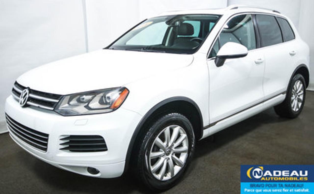 <a href=https://www.autoaubaine.com/Volkswagen-Touareg-c7012031.html>https://www.autoaubaine.com/Volkswagen-Touareg-c7012031.html</a>

JAMAIS ACCIDENTÉ, UN SEUL PROPRIÉTAIRE, 4X4, 2 CLÉS, SYSTÈME DE NAVIGATION, TOIT OUVRANT PANORAMIQUE, INTÉRIEUR DE CUIR, SIÈGES ÉLECTRIQUES ET CHAUFFANTS, VOLANT CHAUFFANT, RÉGULATEUR DE VITESSE, CAMÉRA DE RECUL, BLUETOOTH, VERROUILLAGE SANS CLÉ, JANTES EN ALUMINIUM DE 18 POUCES, CLIMATISATION, GROUPE ÉLECTRIQUE. GARANTIE COMPLETE DE VOLKSWAGEN JUSQUAU 11 JUIN 2018 OU 80000KM. VOLKSWAGEN TOUAREG TDI 2014 A VENDRE A SAINT-JEAN-SUR-RICHELIEU.NADEAU AUTOMOBILES a une solide réputation et tout le personnel est orienté vers la satisfaction à la clientèle. Financement rapide et facile pour 2ième et 3ième chance au crédit. Notre téléphone pour un représentant 1-855-248-3268 ou notre service web personnalisé et par cellulaire 7 jours/7 438-800-4410. Visitez www.nadeauautomobiles.com