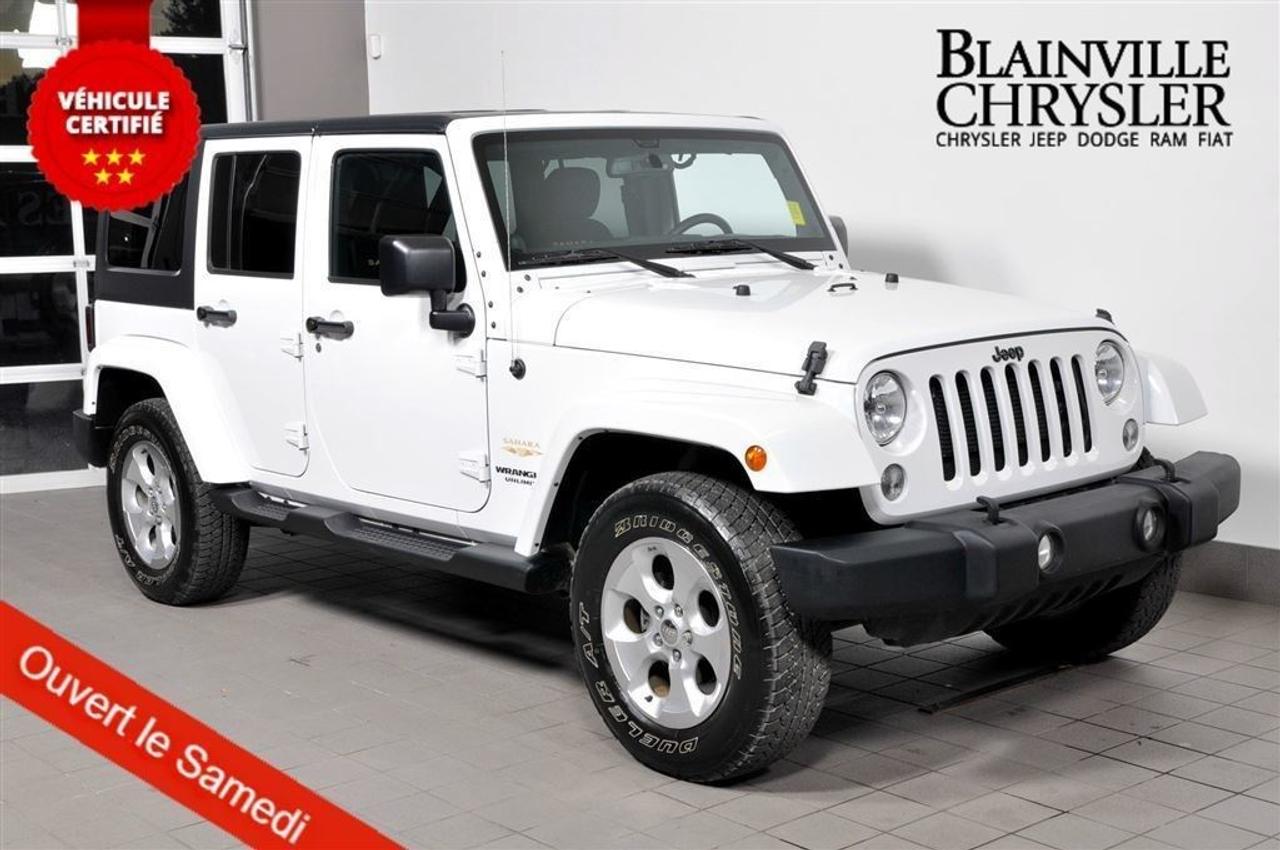 <a href=https://www.blainvillechrysler.com/occasion/Jeep-Wrangler-2014.html>https://www.blainvillechrysler.com/occasion/Jeep-Wrangler-2014.html</a>

JAMAIS ACCIDENTÉ 4X4, TOIT RIGIDE /TOIT MOUE, PHARES AUTOMATIQUES, ÉCRAN TACTILE 6.5 AVEC NAVIGATION, DÉMARREUR À DISTANCE.            NO ACCIDENTS, 4X4, HARD TOP, REAR DIFF 3.21, AUTOMATIC HEAD LIGHTS, TOUCH SCREEN 6.5 WITH NAVIGATION SYSTEM, REMOTE STARTER            ***FINANCEMENT APPROUVÉ À 100% - AUCUN CAS REFUSÉ! - 1, 2, 3 CHANCE AU CRÉDIT! APPROBATION ET LIVRAISON RAPIDE!*** RAPPORT CARPROOF DISPONIBLE!*** TOUS NOS VÉHICULES SONT CERTIFIÉ BLAINVILLE CHRYSLER***SERVICE OFFERT EN FRANÇAIS, ANGLAIS ET ESPAGNOL ****            ***EASY FINANCING 100% APPROVALS! - 1, 2, 3 TYPE OF CREDITS! FAST APPROVAL AND DELIVERY! *** CARPROOF REPORT AVAILABLE! *** ALL OUR VEHICLES ARE BLAINVILLE CHRYSLER CERTIFIED*** WE SERVE YOU IN ENGLISH, FRENCH AND SPANISH ***            WE SERVE THE FOLLOWING COMUNITIES: Montréal, Laval, Sainte Adèle, Saint Sauveur, Mirabel, Saint Jérôme, Prevost, Sainte-Anne-des-lacs, Piedmont, Blainville, Boisbriand, Saint Eustache, Mascouche, Bois des Fillion, Sainte Thérèse, Lachute. *** LOCATION: 249 Boulevard de la Seigneurie O, Blainville, QC (J7C 4N3). Pour de linformations contactez-nous au (450) 419-5337