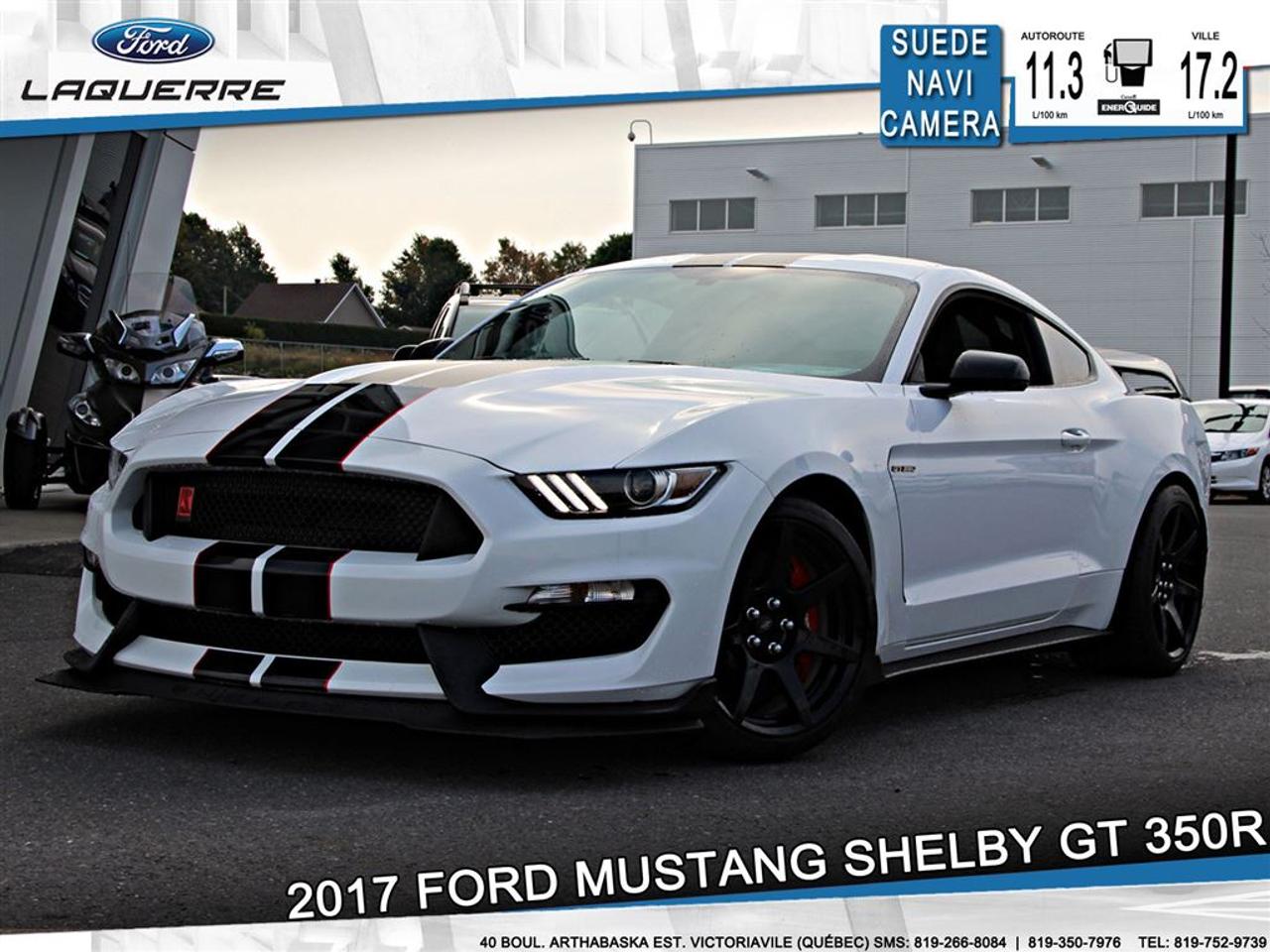 <a href=https://www.laquerreford.com/occasion/Ford-Mustang-2017.html>https://www.laquerreford.com/occasion/Ford-Mustang-2017.html</a>

UN MONSTRE DE PERFORMANCE ET UN SON A COUPER LE SOUFFLE !!     La Shelby GT350R 2017 vous offre un moteur V8 de 5.2L développant 526 chevaux de pur plaisir.   possédant un couple 429 lb pieds, il dévore la route !! Ce véhicule saura vous donner une bonne dose dadrénaline !!    Cest une bête de course possédant toutes les commodités pour rouler à tous les jours.  Les bancs en suède RECARO vous offre un soutien et un confort hors du commun.    - GROUPE DÉQUIPEMENT 920A  - ENSEMBLE R ELECTRONICS  - BANDES RACING  - AUDIO SHAKER  - HOUSSE DE PROTECTION  - VITRES ÉLECTRIQUES  - MIROIRS ÉLECTRIQUES  - PHARES AUTOMATIQUES  - COMMANDES AU VOLANT  - COMMANDES VOCALES  - CONNECTIVITÉ BLUETOOTH  - RÉGULATEUR DE VITESSE  - SYSTÈME ANTIPATINAGE  - NAVIGATION  - CAMERA DE RECUL  - CLIMATISATION 2 ZONES  - RADIO CD / SATELLITE  - RÉGULATEUR DE TEMPÉRATURE AUTOMATIQUE  - PUSH START BUTTON  - PRISE USB / AUXILIAIRE / 12 VOLTS    - VÉHICULE JAMAIS ACCIDENTÉ  - PNBV : 1878  - TAILLE DORIGINE DES PNEUS AVANT : 305/30 ZR19  - TAILLE DORIGINE DES PNEUS ARRIÈRES : 315/30 ZR19    **** LAQUERRE AUTO, LE PLUS GROS INVENTAIRE DE VÉHICULES DOCCASION DES BOIS-FRANCS *** 1ÈRE, 2IÈME ET 3IÈME CHANCE AU CRÉDIT **** TAUX DINTÉRÊT À PARTIR DE 3.99% **** LIVRAISON LE JOUR MÊME **** NOUS LIVRONS PARTOUT AU QUEBEC **** CONTACTEZ NOUS PAR TÉLÉPHONE : 1-866-928-7165 OU PAR TEXTO 1-819-350-7976 / 1-819-266-8084 ****