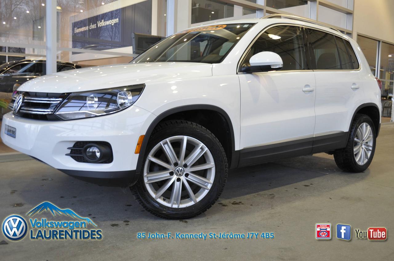 <a href=https://www.vwlaurentides.com/occasion/Volkswagen-Tiguan-2014.html>https://www.vwlaurentides.com/occasion/Volkswagen-Tiguan-2014.html</a>

**CARPROOF DISPONIBLE**OUVERT LE SAMEDI**FINANCEMENT DISPONIBLE AVANTAGEUX**

2014 Volkswagen Tiguan Highline 4motion

4MOTION
TOIT PANORAMIQUE
CUIR NOIR
RÉGULATEUR DE VITESSE
AIR CLIMATISÉ
VITRES ELECTRIQUE
MIROIRS ELECTRIQUES/CHAUFFANTS
BLUETOOTH
SIÈGES CHAUFFANTS ÉLECTRIQUES
MAGS 18 POUCES
SONARS DE STATIONNEMENT
ÉCRAN TACTILE
ANTI-BROUILLARDS


** Volkswagen Laurentides est votre CHOIX #1 de la région des Laurentides! Membre du prestigieux Club Élite Wolfsburg 2014, nous sommes les spécialistes pour tous véhicules doccasions. SERVICE IMBATTABLE! Meilleur financement disponible sur le marché. Rapport dhistorique CARPROOF® fourni gratuitement. Tous véhicules doccasions sont inspectés et passés à la loupe par nos techniciens spécialisés pour vous. Faillite, difficulté de crédit Nous avons la solution! 1ère 2e 3e chance au crédit! Venez faire un tour, nous sommes situés à St-Jérôme à 10 minutes au nord de Blainville/Ste-Thérèse/Boisbriand/Rosemère, à 15 minutes de st-eustache, 15 minutes au nord de Laval, à 30 minutes de Montréal. Au plaisir de vous voir!