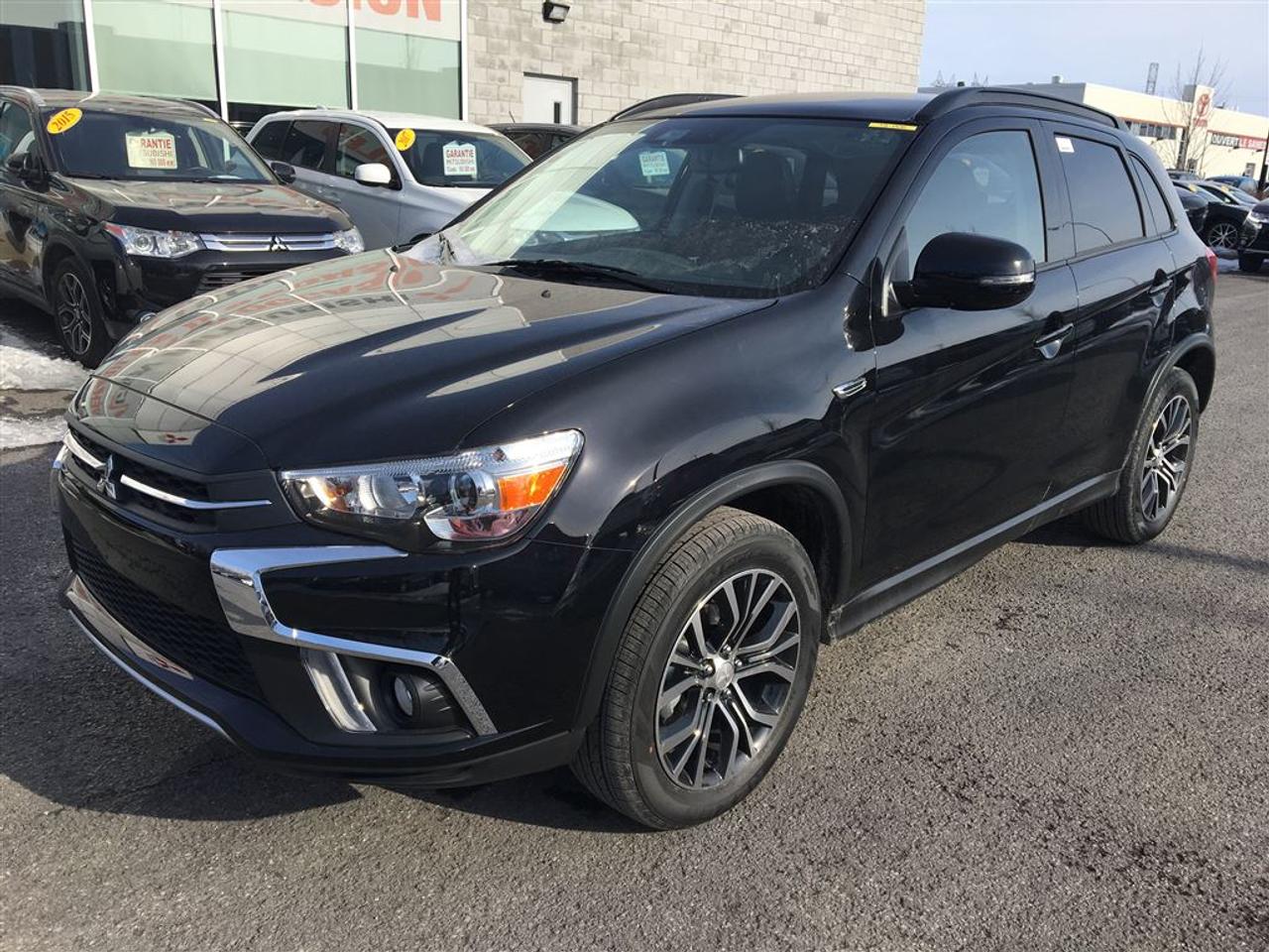<a href=https://www.action-mitsubishi.com/occasion/Mitsubishi-RVR-2018.html>https://www.action-mitsubishi.com/occasion/Mitsubishi-RVR-2018.html</a>

GARANTIE 10ANS/160 000KM* TOIT PANORAMIQUE, 4x4. MOTEUR 2.4L, ÉCRAN DE 6.5 POUCES + APPLE CARPLAY/ANDROID AUTO, Air Climatisé, JANTES EN ALLIAGE DE 18 POUCES, Caméra de Recul, LONGERON DE TOIT, RÉGULATEUR DE VITESSE, PHARES ANTI-BROUILLARD, Sièges Chauffants, RADIO AM/FM/CD/MP3/USB + Commande Audio au Volant + BLUETOOTH 2.0, MIROIRS ÉLECTRIQUES ET CHAUFFANTS, Vitres Électriques et Teintées, TÉLÉ-DÉVERROUILLAGE SANS CLÉ ET BIEN PLUS +++ À VOIR!!!! BALANCE DE LA GARANTIE MITSUBISHI INCLUSE!!! (4WD, AWD, 4 ROUES MOTRICES)    **OUVERT LE SAMEDI/OPEN SATURDAY**        DE PARTOUT AU CANADA SANS FRAIS: 1-877-820-2602. WE ALSO SPEAK ENGLISH, VENEZ en faire LESSAI chez ACTION MITSUBISHI à ST-HUBERT (LONGUEUIL), EN MONTÉRÉGIE, SUR LA RIVE-SUD DE MONTRÉAL. Nous déservons les villes de Beloeil à Longueuil, De Chambly à St-Bruno, De St-Basile à Marieville, De Richelieu à St-Mathias, De Mont-St-Hilaire à Carignan, Le plus gros centre de véhicules doccasion Mitsubishi sur la rive sud de Montréal, à 5 minutes du PONT CHAMPLAIN et JACQUES-CARTIER. Que ce soit pour un véhicule utilitaire sport, une mini-fourgonette, un camion, une convertible (décapotable), une berline, une voiture sport, un coupé 2 portes, un pick-up ou tout autre véhicule, si nous lavons pas en inventaire et bien nous le trouverons pour vous, et ce au meilleur prix du marché comme toujours !!!         Tous nos véhicules sont inspectés, réparés et certifiés CARPROOF. Nous offrons aussi les meilleurs taux dintérêts disponible et 100% dapprobation! Notre service après vente axé sur la satisfaction de nos clients, la qualité de notre personnel, notre transparence et notre professionnalisme ne sont la que 4 autres bonnes raisons de nous faire confiance!! Merci de toute léquipe dACTION MITSUBISHI !!!! www.action-mitsubishi.com        NOUS PRENONS EN ÉCHANGE TOUT LES MARQUE COMME ACURA, AUDI, BMW, CADILLAC CHEVROLET, CHRYSLER, DODGE, FIAT, GMC, HONDA, HYUNDAI, JAGUAR, JEEP, KIA, LAND ROVER, MAZDA, MERCEDEZ, NISSAN, SCION, TOYOTA, VOLKSWAGEN ET AUTRE         NOUS PRENONS EN ÉCHANGE B200, B250, CX3, FIAT500, GLK 350, HRV, Q3, RENEGADE, SPORTAGE, TUCSON, TRAX, TIGUAN, X1 ET AUTRES.