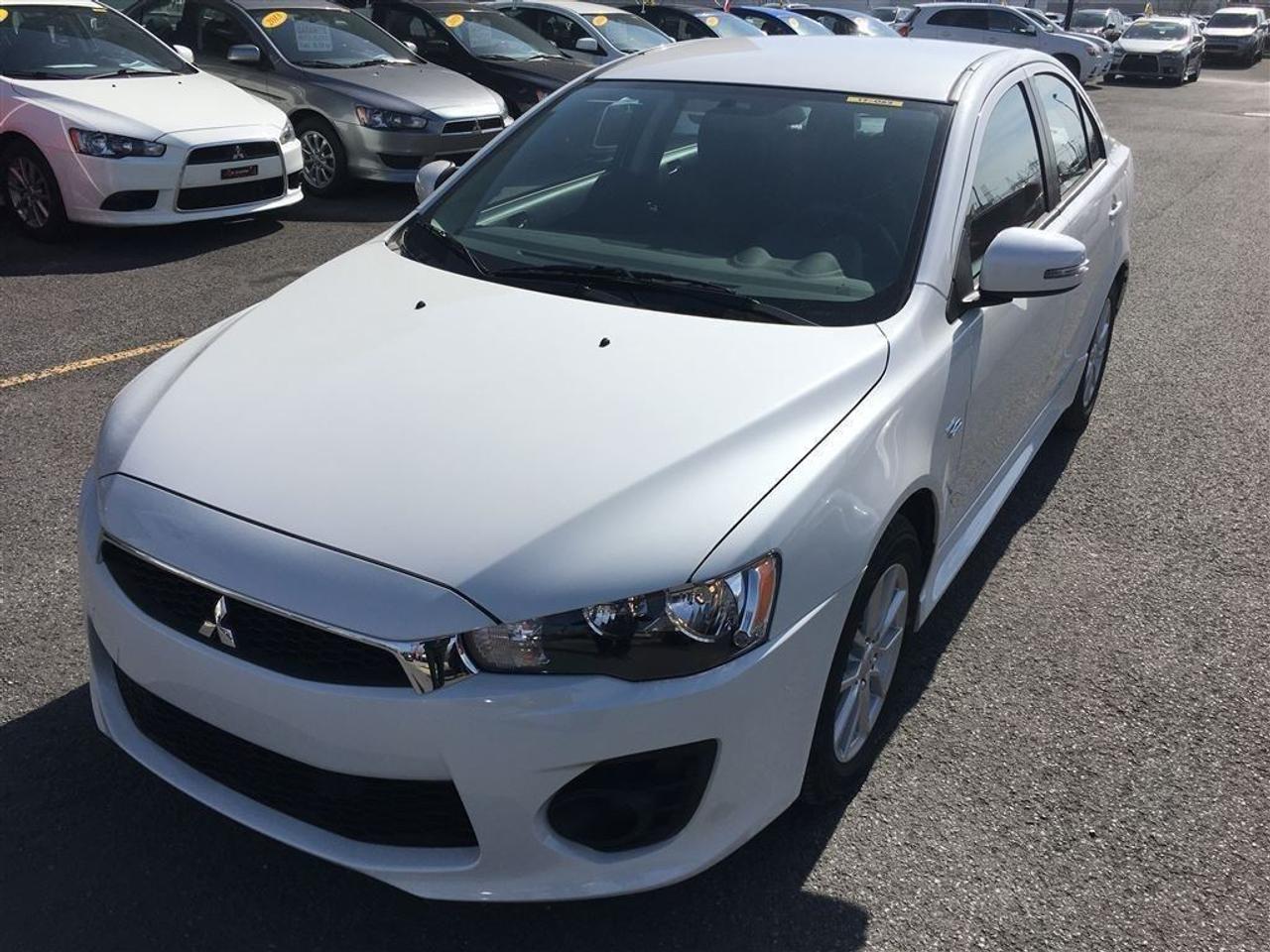 <a href=https://www.action-mitsubishi.com/occasion/Mitsubishi-Lancer-2017.html>https://www.action-mitsubishi.com/occasion/Mitsubishi-Lancer-2017.html</a>

*SPÉCIAL DEMO*BAS KM* GARANTIE 10 ANS/160 000KM* Moteur 2.4L, 4 ROUES MOTRICES, Air Climatisé, Vitres électriques, RÉGULATEUR DE VITESSE, Sièges chauffants, FREINS ABS, Anti-patinage, RADIO CD/MP3/USB + COMMANDE AUDIO AU VOLANT + BLUETOOTH 2.0, Miroirs Électriques et Chauffants, JANTES EN ALLIAGES DE 16 POUCES, Télé-déverrouillage, Possibilité dajouter un aileron et bien plus +++ Balance de la garantie Mitsubishi de incluse! (4x4, AWC, AWD, 4WD) **OUVERT LE SAMEDI/OPEN SATURDAY**        DE PARTOUT AU CANADA SANS FRAIS: 1-877-820-2602. WE ALSO SPEAK ENGLISH, VENEZ en faire LESSAI chez ACTION MITSUBISHI ST-HUBERT (LONGUEUIL), EN MONTÉRÉGIE, SUR LA RIVE-SUD DE MONTRÉAL. Nous déservons les villes de Beloeil à Longueuil, De Chambly à St-Bruno, De St-Basile à Marieville, De Richelieu à St-Mathias, De Mont-St-Hilaire à Carignan, Le plus gros centre de véhicules doccasion Mitsubishi sur la rive sud de Montréal, à 5 minutes du PONT CHAMPLAIN et JACQUES-CARTIER. Que ce soit pour un véhicule utilitaire sport, une mini-fourgonette, un camion, une convertible (décapotable), une berline, une voiture sport, un coupé 2 portes, un pick-up ou tout autre véhicule, si nous lavons pas en inventaire et bien nous le trouverons pour vous, et ce au meilleur prix du marché comme toujours !!!        Tous nos véhicules sont inspectés, réparés et certifiés CARPROOF. Nous offrons aussi les meilleurs taux dintérêts disponible et 100% dapprobation! Notre service après vente axé sur la satisfaction de nos clients, la qualité de notre personnel, notre transparence et notre professionnalisme ne sont la que 4 autres bonnes raisons de nous faire confiance!! Merci de toute léquipe dACTION MITSUBISHI !!! www.action-mitsubishi.com        NOUS PRENONS EN ÉCHANGE TOUT LES MARQUE COMME ACURA, AUDI, BMW, CADILLAC CHEVROLET, CHRYSLER, DODGE, FIAT, GMC, HONDA, HYUNDAI, JAGUAR, JEEP, KIA, LAND ROVER, MAZDA, MERCEDEZ, NISSAN, SCION, TOYOTA, VOLKSWAGEN ET AUTRE         NOUS PRENONS EN ÉCHANGE CIVIC, COROLLA, CRUZE, C250, C300, C350, DART, ELANTRA, FORTE, FOCUS, FRS, GOLF, KOUP, MAZDA 3, SENTRA, TC, 128I, 135I ET AUTRES.