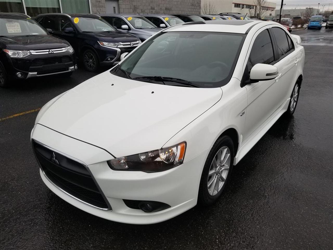 <a href=https://www.action-mitsubishi.com/occasion/Mitsubishi-Lancer-2015.html>https://www.action-mitsubishi.com/occasion/Mitsubishi-Lancer-2015.html</a>

GARANTIE 10 ANS/160 000KM* UNE SEULE PROPRIÉTAIRE! JAMAIS ACCIDENTÉ! TOIT OUVRANT, Sièges Chauffants, AILERON, PHARES ANTI-BROUILLARD, Air Climatisé, JANTES EN ALLIAGE DE 16 POUCES, Radio CD/MP3/USB + Commande Audio au Volant + BLUETOOTH 2.0, Régulateur de Vitesse, MIROIRS ÉLECTRIQUES ET CHAUFFANTS, Vitres Électriques, TÉLÉ-DÉVERROUILLAGE ET BIEN PLUS +++ À NE PAS MANQUER! CONDITION A1!!! BALANCE DE LA GARANTIE MITSUBISHI INCLUSE!!! **OUVERT LE SAMEDI/OPEN SATURDAY**  DE PARTOUT AU CANADA SANS FRAIS: 1-877-820-2602. WE ALSO SPEAK ENGLISH!  VENEZ en faire LESSAI chez ACTION MITSUBISHI ST-HUBERT (LONGUEUIL), EN MONTÉRÉGIE, SUR LA RIVE-SUD DE MONTRÉAL. Nous desservons les villes de Beloeil à Longueuil, De Chambly à St-Bruno, De St-Basile à Marieville, De Richelieu à St-Mathias, De Mont-St-Hilaire à Carignan, Le plus gros centre de véhicules doccasion Mitsubishi sur la rive sud de Montréal, à 5 minutes du PONT CHAMPLAIN et JACQUES-CARTIER. Que ce soit pour un véhicule utilitaire sport, une mini-fourgonette, un camion, une convertible (décapotable), une berline, une voiture sport, un coupé 2 portes, un pick-up ou tout autre véhicule, si nous lavons pas en inventaire et bien nous le trouverons pour vous, et ce au meilleur prix du marché comme toujours !!!   Tous nos véhicules sont inspectés, réparés et certifiés CARPROOF. Nous offrons aussi les meilleurs taux dintérêts disponible et 100% dapprobation! Notre service après vente axé sur la satisfaction de nos clients, la qualité de notre personnel, notre transparence et notre professionnalisme ne sont la que 4 autres bonnes raisons de nous faire confiance!! Merci de toute léquipe dACTION MITSUBISHI !!! www.action-mitsubishi.com   NOUS PRENONS EN ÉCHANGE TOUT LES MARQUE COMME ACURA, AUDI, BMW, CADILLAC CHEVROLET, CHRYSLER, DODGE, FIAT, GMC, HONDA, HYUNDAI, JAGUAR, JEEP, KIA, LAND ROVER, MAZDA, MERCEDEZ, NISSAN, SCION, TOYOTA, VOLKSWAGEN ET AUTRE   NOUS PRENONS EN ÉCHANGE CIVIC, COROLLA, CRUZE, C250, C300, C350, DART, ELANTRA, FORTE, FOCUS, FRS, GOLF, KOUP, MAZDA 3, SENTRA, TC, 128I, 135I ET AUTRES.