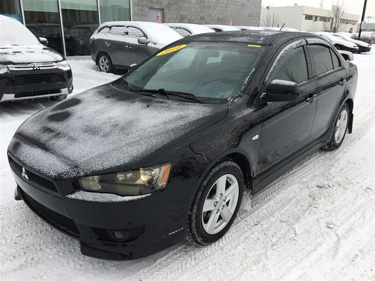 <a href=https://www.action-mitsubishi.com/occasion/Mitsubishi-Lancer-2014.html>https://www.action-mitsubishi.com/occasion/Mitsubishi-Lancer-2014.html</a>

GARANTIE 10 ANS/160 000KM* TOIT OUVRANT, Sièges Chauffants, AILERON, PHARES ANTI-BROUILLARD, Air Climatisé, JANTES EN ALLIAGE DE 16 POUCES, Radio CD/MP3/USB + Commande Audio au Volant + BLUETOOTH 2.0, Régulateur de Vitesse, MIROIRS ÉLECTRIQUES ET CHAUFFANTS, Vitres Électriques, TÉLÉ-DÉVERROUILLAGE ET BIEN PLUS +++ À NE PAS MANQUER! CONDITION A1!!! BALANCE DE LA GARANTIE MITSUBISHI INCLUSE!!! **OUVERT LE SAMEDI/OPEN SATURDAY**          DE PARTOUT AU CANADA SANS FRAIS: 1-877-820-2602. WE ALSO SPEAK ENGLISH!        VENEZ en faire LESSAI chez ACTION MITSUBISHI ST-HUBERT (LONGUEUIL), EN MONTÉRÉGIE, SUR LA RIVE-SUD DE MONTRÉAL. Nous desservons les villes de Beloeil à Longueuil, De Chambly à St-Bruno, De St-Basile à Marieville, De Richelieu à St-Mathias, De Mont-St-Hilaire à Carignan, Le plus gros centre de véhicules doccasion Mitsubishi sur la rive sud de Montréal, à 5 minutes du PONT CHAMPLAIN et JACQUES-CARTIER. Que ce soit pour un véhicule utilitaire sport, une mini-fourgonette, un camion, une convertible (décapotable), une berline, une voiture sport, un coupé 2 portes, un pick-up ou tout autre véhicule, si nous lavons pas en inventaire et bien nous le trouverons pour vous, et ce au meilleur prix du marché comme toujours !!!         Tous nos véhicules sont inspectés, réparés et certifiés CARPROOF. Nous offrons aussi les meilleurs taux dintérêts disponible et 100% dapprobation! Notre service après vente axé sur la satisfaction de nos clients, la qualité de notre personnel, notre transparence et notre professionnalisme ne sont la que 4 autres bonnes raisons de nous faire confiance!! Merci de toute léquipe dACTION MITSUBISHI !!! www.action-mitsubishi.com         NOUS PRENONS EN ÉCHANGE TOUT LES MARQUE COMME ACURA, AUDI, BMW, CADILLAC CHEVROLET, CHRYSLER, DODGE, FIAT, GMC, HONDA, HYUNDAI, JAGUAR, JEEP, KIA, LAND ROVER, MAZDA, MERCEDEZ, NISSAN, SCION, TOYOTA, VOLKSWAGEN ET AUTRE         NOUS PRENONS EN ÉCHANGE CIVIC, COROLLA, CRUZE, C250, C300, C350, DART, ELANTRA, FORTE, FOCUS, FRS, GOLF, KOUP, MAZDA 3, SENTRA, TC, 128I, 135I ET AUTRES.