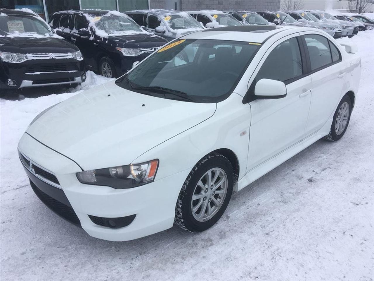 <a href=https://www.action-mitsubishi.com/occasion/Mitsubishi-Lancer-2013.html>https://www.action-mitsubishi.com/occasion/Mitsubishi-Lancer-2013.html</a>

UNE SEULE PROPRIÉTAIRE! Toit Ouvrant, AIR CLIMATISÉ, Aileron, RÉGULATEUR DE VITESSE, SIÈGES CHAUFFANTS, Radio AM/FM/MP3/CD/USB + Commande Audio au Volant + BLUETOOTH 2.0, Miroirs Électriques et Chauffants, VITRES ÉLECTRIQUES, Télé-Déverrouillage, JANTES EN ALLIAGE DE 16 POUCES ET BIEN PLUS +++ VÉHICULE RECONSTRUIT, À NE PAS MANQUER !!! (EDITION LIMITÉE, LIMITED EDITION)**OUVERT LE SAMEDI/OPEN SATURDAY**          ONE OWNER! Sunroof, AC, Spoiler, Cruise Control, HEATED SEATS, Radio AM/FM/MP3/CD/USB with Audio control on steering wheel + BLUETOOTH 2.0, Electric and heated mirrors. Power Windows, Central lock with Remote, 16 Alloy Wheels and much much more +++ NOT TO MISS !!! (LIMITED EDITION)        APPELEZ-NOUS/ CALL US: (450) 443-7330. DE PARTOUT AU CANADA SANS FRAIS/ ANYWHERE IN CANADA FREE OF CHARGE: 1-877-820-2602 VENEZ en faire LESSAI chez ACTION MITSUBISHI à ST-HUBERT (LONGUEUIL), EN MONTÉRÉGIE, SUR LA RIVE-SUD DE MONTRÉAL.     Que ce soit pour un véhicule utilitaire sport, une mini-fourgonnette, un camion, une convertible (décapotable), une berline, une voiture sport, un coupé 2 portes, un pick-up ou tout autre véhicule, si nous lavons pas en inventaire et bien nous le trouverons pour vous, et ce au meilleur prix du marché comme toujours !!!     Tous nos véhicules sont inspectés, réparés et certifiés CARPROOF. Nous offrons aussi les meilleurs taux dintérêts disponible et 100% dapprobation! Notre service après vente axé sur la satisfaction de nos clients, la qualité de notre personnel, notre transparence et notre professionnalisme ne sont la que 4 autres bonnes raisons de nous faire confiance!     Nous déservons les villes de Beloeil à Longueuil, De Chambly à St-Bruno, De St-Basile à Marieville, De Richelieu à St-Mathias, De Mont-St-Hilaire à Carignan, Le plus gros centre de véhicules doccasion Mitsubishi sur la rive sud de Montréal, à 5 minutes du PONT CHAMPLAIN et JACQUES-CARTIER. Merci de toute léquipe dACTION MITSUBISHI !!! www.action-mitsubishi.com     NOUS PRENONS EN ÉCHANGE TOUTES LES MARQUES COMME ACURA, AUDI, BMW, CADILLAC CHEVROLET, CHRYSLER, DODGE, FIAT, GMC, HONDA, HYUNDAI, JAGUAR, JEEP, KIA, LAND ROVER, MAZDA, MERCEDEZ, NISSAN, SCION, TOYOTA, VOLKSWAGEN ET AUTRE. NOUS PRENONS AUSSI EN ÉCHANGE TOUS LES MODÈLES TELS QUE CIVIC, COROLLA, CRUZE, C250, C300, 350, DART, ELANTRA, FORTE, FOCUS, FRS, GOLF, KOUP, MAZDA 3, SENTRA, TC, 128I, 135I ET AUTRES. Au plaisir de vous servir !!        Come and test drive your next vehicle at ACTION MITSUBISHI in ST HUBERT, on the SOUTH SHORE of MONTREAL. We have the largest inventory of used Mitsubishi vehicles on the South Shore of Montreal . We are located 5 minutes from CHAMPLAIN AND JACQUES-CARTIER BRIDGE. If you do not see what you are looking for in our inventory, let us know and we will find it for you at the cheapest price possible, AS USUAL!     All our cars are INSPECTED, REPAIRED and CARPROOF Certified. We offer the best interest rate available and have a 100% approval rate!     We trade in every brand and model. Please visit us on www.action-mitsubishi.com and on behalf of Action Mitsubishi, thank you for browsing our vehicles.