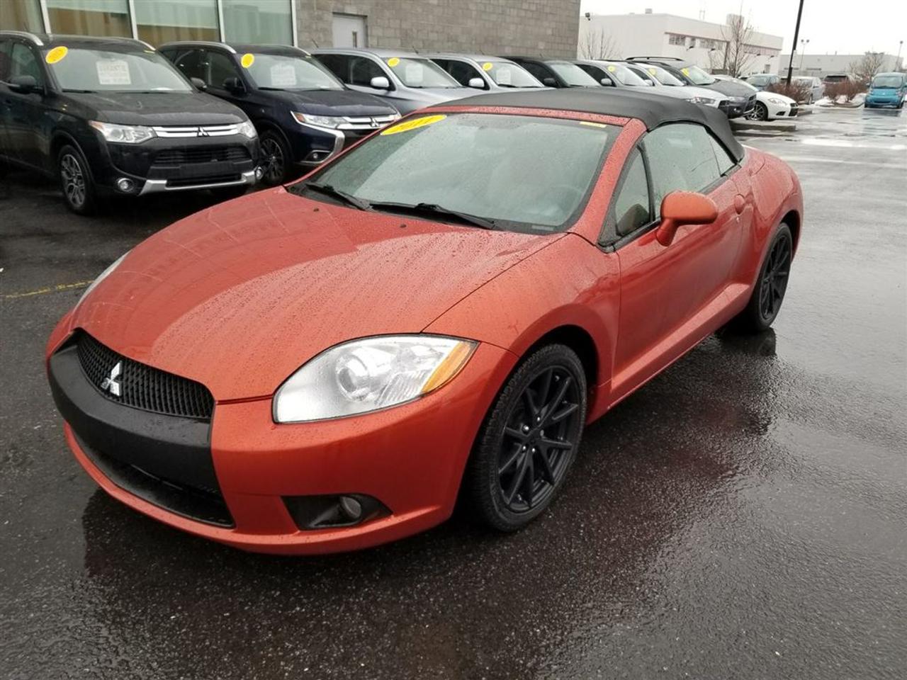 <a href=https://www.action-mitsubishi.com/occasion/Mitsubishi-Eclipse_Spyder-2011.html>https://www.action-mitsubishi.com/occasion/Mitsubishi-Eclipse_Spyder-2011.html</a>

GARANTIE 10 ANS/160 000KM* UN SEUL PROPRIÉTAIRE! CONVERTIBLE! MOTEUR V6 265HP, MANUELLE 6 VITESSES, TOIT OUVRANT, CUIR (TERRA COTTA) LOOK UNIQUE!!! LUMIÈRE HID AJUSTABLE, JANTES EN ALLIAGES DE 18 POUCES, ROCKFORD FOSGATE 650 WATTS + SUBWOOFER DE 10 POUCES, CAMÉRA DE RECUL, RÉGULATEUR DE VITESSE, BLUETOOTH, COMMANDES AUDIO AU VOLANT, VITRES ÉLECTRIQUES, MIROIRS ÉLECTRIQUES ET CHAUFFANTS, ESSUI-GLACE INTERMITTENT, TÉLÉ-DÉVERROUILAGE ET BIEN PLUS +++ À NE PAS MANQUEZ!!! VOITURE QUI FAIT TOURNER LES TÊTES!!!   **OUVERT LE SAMEDI/OPEN SATURDAY**  APPELEZ-NOUS/CALL US: (450) 443-7330.  DE PARTOUT AU CANADA SANS FRAIS/ FREE OF CHARGE ANYWHERE ELSE IN CANADA: 1-877-820-2602!  VENEZ en faire LESSAI chez ACTION MITSUBISHI à ST-HUBERT (LONGUEUIL), EN MONTÉRÉGIE, SUR LA RIVE-SUD DE MONTRÉAL. Nous déservons les villes de Beloeil à Longueuil, De Chambly à St-Bruno, De St-Basile à Marieville, De Richelieu à St-Mathias, De Mont-St-Hilaire à Carignan, Le plus gros centre de véhicules doccasion Mitsubishi sur la rive sud de Montréal, à 5 minutes du PONT CHAMPLAIN et JACQUES-CARTIER. Que ce soit pour un véhicule utilitaire sport, une mini-fourgonette, un camion, une convertible (décapotable), une berline, une voiture sport, un coupé 2 portes, un pick-up ou tout autre véhicule, si nous lavons pas en inventaire et bien nous le trouverons pour vous, et ce au meilleur prix du marché comme toujours !!!   Tous nos véhicules sont inspectés, réparés et certifiés CARPROOF. Nous offrons aussi les meilleurs taux dintérêts disponible et 100% dapprobation! Notre service après vente axé sur la satisfaction de nos clients, la qualité de notre personnel, notre transparence et notre professionnalisme ne sont la que 4 autres bonnes raisons de nous faire confiance!! Merci de toute léquipe dACTION MITSUBISHI !!! www.action-mitsubishi.com   NOUS PRENONS EN ÉCHANGE TOUT LES MARQUE COMME ACURA, AUDI, BMW, CADILLAC CHEVROLET, CHRYSLER, DODGE, FIAT, GMC, HONDA, HYUNDAI, JAGUAR, JEEP, KIA, LAND ROVER, MAZDA,   NOUS PRENONS EN ÉCHANGE CIVIC, COROLLA, CRUZE, C250, C300, C350, DART, ELANTRA, FORTE, FOCUS, FRS, GOLF, KOUP, MAZDA 3, SENTRA, TC, 128I, 135I ET AUTRES.  Come and test drive your next vehicle at ACTION MITSUBISHI in ST HUBERT, on the SOUTH SHORE of MONTREAL. We have the largest inventory of used Mitsubishi vehicles on the South Shore of Montreal . We are located 5 minutes from CHAMPLAIN AND JACQUES-CARTIER BRIDGE. If you do not see what you are looking for in our inventory, let us know and we will find it for you at the cheapest price possible, AS USUAL!  All our cars are INSPECTED, REPAIRED and CARPROOF Certified. We offer the best interest rate available and have a 100% approval rate!   We trade in every brand and model. Please visit us on www.action-mitsubishi.com and on behalf of Action Mitsubishi, thank you for browsing our vehicles.