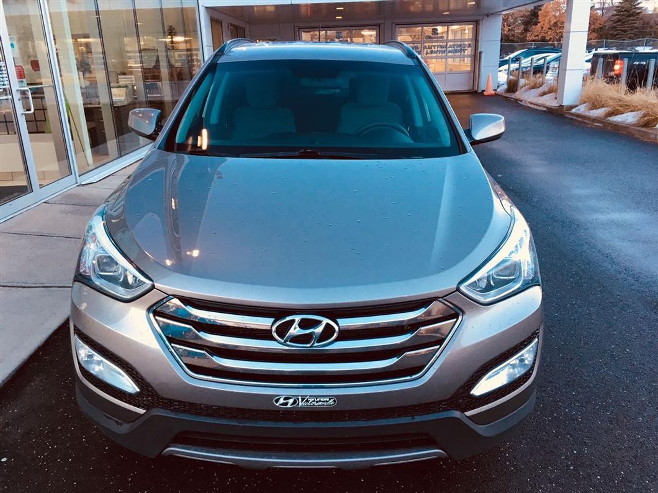 <a href=https://www.riendeauhyundai.com/occasion/Hyundai-Santa_Fe_Sport-2013.html>https://www.riendeauhyundai.com/occasion/Hyundai-Santa_Fe_Sport-2013.html</a>

**JAMAIS ACCIDENTÉ**UN SEUL PROPRIÉTAIRE**CLIMATISEUR, VITRES ET PORTIÈRES ÉLECTRIQUES, MAIN LIBRE BLUETOOTH, PHARES ANTIBROUILLARD, RÉGULATEUR DE VITESSE, MAGS, SIÈGES CHAUFFANTS, RÉTROVISEURS ÉLECTRIQUES ET CHAUFFANTS, RÉGULATEUR DE VITESSE...rabais au financement de 490$ inclus dans le prix affiché!!!      RIENDEAU HYUNDAI        Un concessionnaire établi depuis 1993 ayant vue 3 générations.           Ouvert le samedi de 10h à 16h      Rejoignez-nous en tout temps au 514-709-2886.           Vous manquez de temps pour venir nous visiter? Laissez-nous le savoir et profitez de notre service de visite à domicile ou au travail selon votre horaire!           Sachez que tous nos véhicules sont inspectés par nos techniciens certifiés Hyundai et quun rapport Carproof est disponible en tout temps sur demande.           Venez faire lexpérience Riendeau Hyundai et choisissez parmi notre vaste inventaire de véhicules doccasion avec des taux certifiés à partir de 2.9% et demandez à propos de nos promotions sur nos pneus dhivers.           À proximité de Montréal, Longueuil, Brossard, St-Hubert, St-Hyacinthe, Drummondville, Saint-Basile-le-Grand, Boucherville, Varennes et Chambly. Venez constatez pourquoi tant de clients choisissent Riendeau Hyundai et rien dautre.           ================================================================          A dealer establish since 1993 and with 3 generations.           Open on Saturday from 10h to 16h.       Call us anytime at 514-709-2886.           Lacking time to visit us? Let us know and benefit of our home and office service following your schedule.           Know that our vehicles are inspected by our Hyundai certified technicians and that a Carproof report is available at anytime on demand.           Come meet the experience Riendeau Hyundai and chose within our massive inventory of used car with certified interest rate starting at 2.9% and ask us about our promotion on winter tires.          Close to Montreal, Longueuil, Brossard, St-Hubert, Ste-Hyacinthe, Drummondville, Saint-Basile-le-Grand, Boucherville, Varennes and Chambly. Let us show you why so many customer choose Riendeau Hyundai and nothing else!