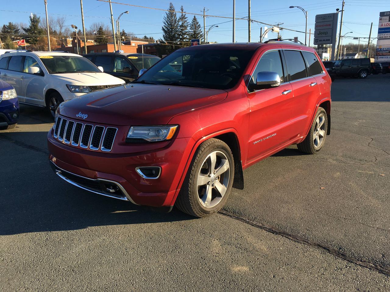 <a href=https://www.nvcloutier.com/occasion/Jeep-Grand_Cherokee-2014.html>https://www.nvcloutier.com/occasion/Jeep-Grand_Cherokee-2014.html</a>

GR CHEROKEE OVERLAND, INTERIEUR EN CUIR, TOIT PANORAMIQUE, G P S , CAMERA DE RECUL , BAS KILOMETRAGE 
GARANTIE CHRYSLER 14 MAI 2020 OU 100,000 KMS