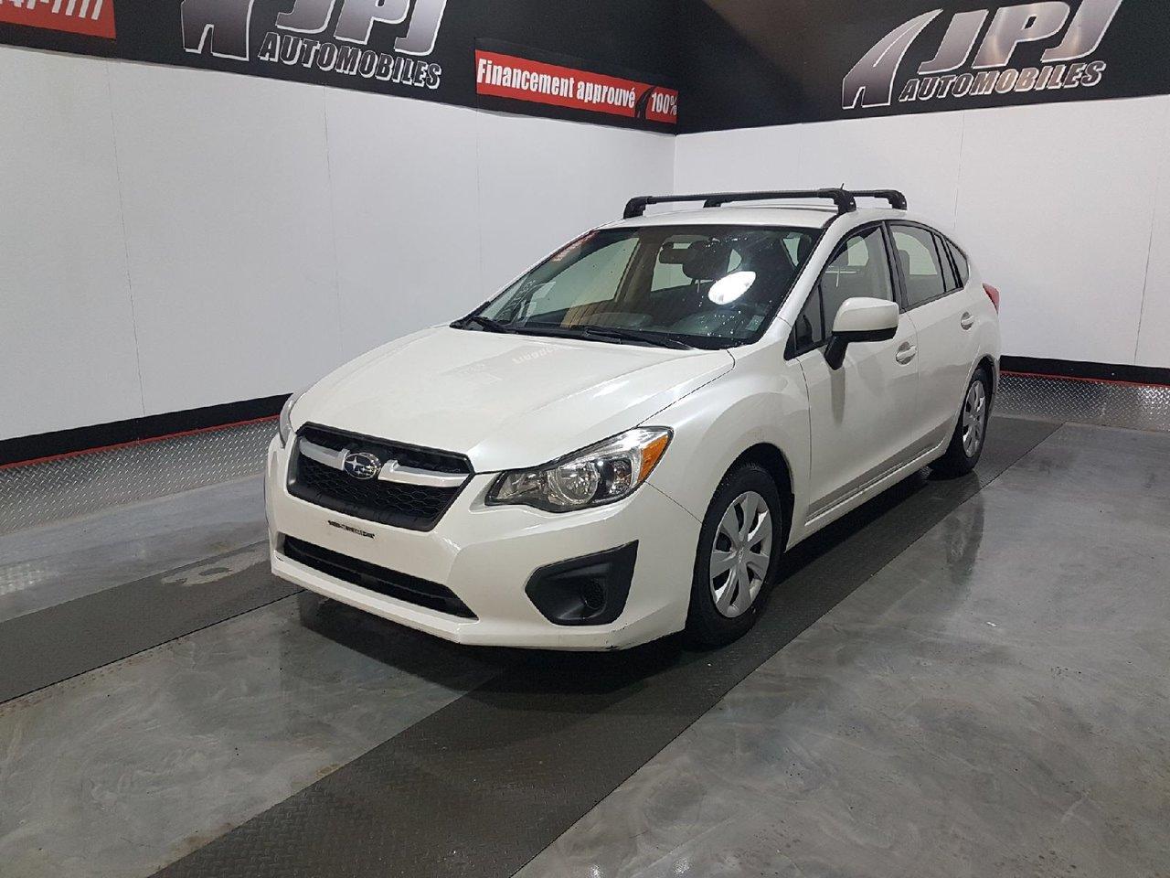 Used 2014 Subaru Impreza AWD for sale in Carignan, QC