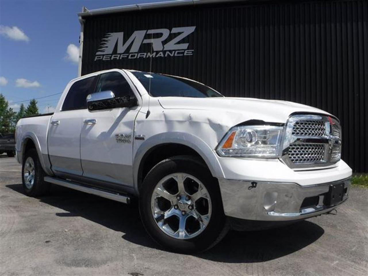 <a href=https://www.autoaubaine.com/Dodge-RAM 1500-c6570439.html>https://www.autoaubaine.com/Dodge-RAM 1500-c6570439.html</a>

** Garantie 5ans/100 000km sur groupe moto-propulseur à partir de la dms et MRZ ajoute 3mois/5000km sur lensemble (3ans dorigine étant terminé)  ** ÉCONOMIE GARANTIE DE 10% et même plus dans la majorité des cas! ** Service inégalé - Financement avantageux - Échanges acceptés - On équivaut la garantie dorigine! ** Cest  LENGAGEMENT MRZ - découvrez en tous les avantages au www.MRZPERFORMANCE.com et en magasin **

** VÉHICULE EN RÉPARATION, DISPONIBLE SOUS PEU** DISPONIBILITÉ ET PRIX A CONFIRMER LORS DE LA MISE EN VENTE A LÉTAT RÉPARÉ - Dodge Ram 1500 Laramie 4X4 2014 Blanc métallique avec bas gris et intérieur en cuir noir, Crew cab avec boite de 5.5pi - ÉTAT NEUF a 26 500km SEULEMENT - Faites lenvie de tous avec un des plus beau camion sur le marché! Modèle Laramie FULL FULL équip!! Il ne manque absolument rien comme équipement!! Faites vites ces camions sont en très grande demande!! - * Visitez le WWW.MRZPERFORMANCE.COM pour tous les détails et beaucoup plus de photos!! * - Moteur V8 5.7l HEMI de 390HP avec transmission automatique 8 rapports avec bouton électronique. Très puissant! ÉTAT NEUF!! Très bas kilométrage, Seulement 26 500 km! 4X4 Crew Cab avec boite de 5.5pi. Camion FULL ÉQUIP!! Mags 20 chrome avec pneus en bonne condition! - Miroirs électriques et chauffants - Gros Miroirs chrome - Towing Package - Commandes au volant - Bluetooth - Sirius - Prise USB - Prise 12V et 115V - Backglass sliding électrique - Intérieur en cuir noir - A/C dual zones - Cruise control - Tout électrique - Fogs - Console centrale - Système navigation GPS avec grosse écran tactile - Vitres teintées - Caméra de recul - Chauffe moteur - Vitres électriques - Sièges électriques, chauffants et climatisants - Wiper intermittent - Différentiel autobloquant - Télécommande porte garage - Toit ouvrant - Lumières avant projector halogène - Push to start (démarrage) - 1 Clé intelligente avec Démarreur OEM - Volant chauffant - Lumières arrière LED - Line X - Pédale ajustable - Système audio ALPINE avec Sub - Boite frein électrique - Lecteur CD/MP3 - Sièges arrière chauffant - Marchepieds chrome - Moulures dailes - Tonneau cover TRIFECTA - Sensor de recul - Bumper et Grille chrome - etc!! Tout un truck!- À voir sans faute! - Ce camion avait subit de légers dommages, réparé par des professionnels et inspecté par la SAAQ en 195 points. Nous sommes fiers de notre travail et CE VÉHICULE SERA IMPECCABLE à tout point de vue!! Impossible de trouver meilleur qualité prix chez la concurrence! Camion vraiment FULL FULL ÉQUIP!! Il est à létat neuf avec seulement 26 500km au compteur!! Encore une fois les plus beaux camions se retrouvent chez Automobiles MRZ!! Valeur neuf de plus de 60 000$ sur la feuille de vitre Dodge!! Pick-up très recherché!! *Reconstruit / Rebuilt title Véhicule Canadien* - PLUSIEURS AUTRES PICK-UP EN STOCK!! Venez nous voir ou allez visiter notre site internet pour plus dinformations! - Nhésitez pas à nous rejoindre avec vos questions! Automobiles MRZ, la référence dans laccidenté léger au Québec! WE SPEAK ENGLISH PLEASE CONTACT US - MRZ IS THE VEHICLE CAR EXPORT and IMPORT SPECIALIST - USA - AFRICA - MIDDLE EAST - EUROPE - MRZ EST LE SPÉCIALISTE EN EXPORTATION et IMPORTATION DE VÉHICULES - USA - AFRIQUE - EUROPE - PROCHE ORIENT Visitez-nous aussi sur Facebook! Merci!