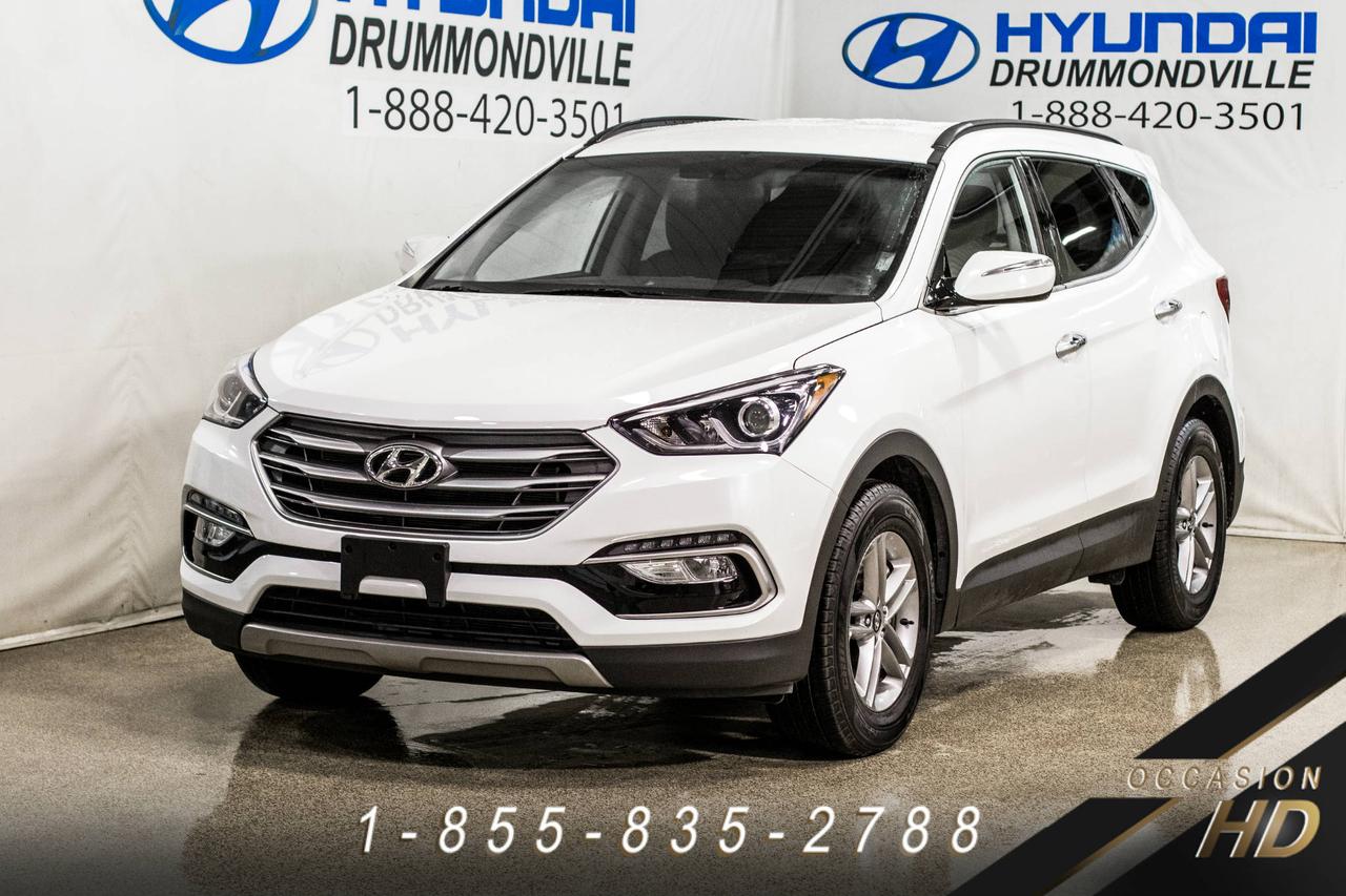 <a href=https://www.hyundaidrummondville.com/occasion/Hyundai-Santa_Fe_Sport-2018.html>https://www.hyundaidrummondville.com/occasion/Hyundai-Santa_Fe_Sport-2018.html</a>

***PROMO DÉMO*** LOCATION COURT TERME ~ GARANTIE + JAMAIS ACCIDENTÉ / SANTA FE SPORT 2018 2.4L PREMIUM AWD CAMÉRA DE RECUL, DÉTECTEUR D ANGLE MORT, VOLANT CHAUFFANT, SIÈGES CHAUFFANTS AV/ARR, CLIMATISATION 2 ZONES, BLUETOOTH, PHARES ANTIBROUILLARDS, MAGS 17 POUCES, ÉCRAN TACTILE ET BIEN PLUS!!  CE ROBUSTE VUS POSSÈDE UN MOTEUR FORT INTÉRESSANT À LA FOIS PUISSANCE ET ÉCONOMIE!! IL EST APPRÉCIÉ POUR SA COMMODITÉ, SON HABITACLE TRÈS BIEN ÉQUIPÉ OFFRANT UNE GRANDE ESPACE CARGO, SA GARANTIE COMPLÈTE 5 ANS / 100 000 KM AINSI QUE SON DESIGN ÉLÉGANT ET SPORTIF! LE VUS QUI SADAPTE À VOTRE STYLE DE VIE! PASSEZ DÈS AUJOURDHUI POUR EN FAIRE LESSAI ROUTIER!!

POUR PRENDRE RENDEZ-VOUS POUR UN ESSAI ROUTIER OU POUR OBTENIR PLUS DE DÉTAILS, VOUS POUVEZ COMMUNIQUER SANS FRAIS AU : 1-888-420-3501, VIA MESSAGERIE TEXTE OU APPEL AU 819 314-6555 OU PAR COURRIEL AU USAGE@HYUNDAIDRUMMONDVILLE.CA EN TOUT TEMPS MÊME LES SOIRS ET LES FINS DE SEMAINE !!! PRIX ÉTABLI AVEC UN FINANCEMENT À TAUX RÉGULIER!

1ERE, 2E ET 3E CHANCE AU CRÉDIT!! AUCUN CAS REFUSÉ!!
FINANCEMENT ET GARANTIE DISPONIBLE SUR PLACE!!
NOUS REPRENONS TOUS VOS ÉCHANGES, MOTO - VTT - BATEAU - ROULOTTE - MOTORISÉ - AVION - QUADRIPORTEUR!!