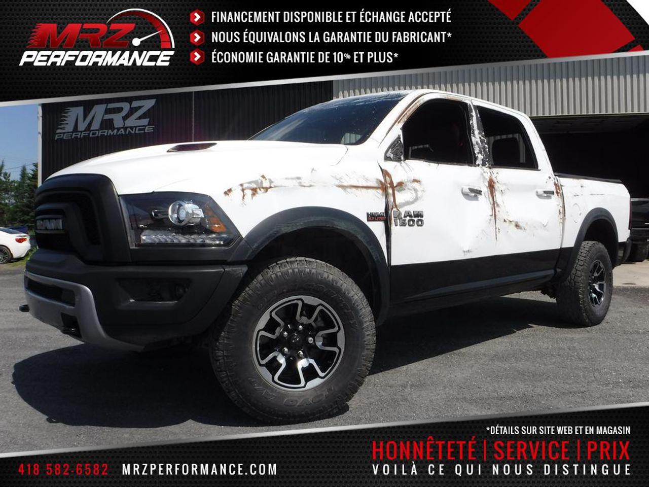 <a href=https://www.autoaubaine.com/Dodge-RAM 1500-c6871810.html>https://www.autoaubaine.com/Dodge-RAM 1500-c6871810.html</a>

** Garantie 3ans/60 000km sur lensemble du véhicule et 5ans/100 000km sur groupe moto-propulseur à partir de la dms ** ÉCONOMIE GARANTIE DE 10% et même plus dans la majorité des cas! ** Service inégalé - Financement avantageux - Échanges acceptés - On équivaut la garantie dorigine! ** Cest LENGAGEMENT MRZ - découvrez en tous les avantages au www.MRZPERFORMANCE.com et en magasin **

** VÉHICULE EN RÉPARATION, DISPONIBLE SOUS PEU** DISPONIBILITÉ ET PRIX A CONFIRMER LORS DE LA MISE EN VENTE A LÉTAT RÉPARÉ - Dodge Ram 1500 REBEL 4X4 2016 Blanc avec bas de caisse noir avec intérieur en cuir/tissu brodé noir et rouge. Crew cab avec boite de 5.5pi - Un truck avec un look denfer à voir absolument! - Faites lenvie de tous avec un des plus beau camion sur le marché! Très rare sur le marché!! Carrément à létat neuf avec très peu de kilo au compteur!! Réservez le tôt, il ne restera pas longtemps disponible dans nôtre bel inventaire de camion prêt à partir!!- * Visitez le WWW.MRZPERFORMANCE.COM pour tous les détails et beaucoup plus de photos!! * - Faites vite, RAM REBEL très rare sur le marché!! - Moteur V8 5.7l HEMI de 390HP avec transmission automatique 8 rapports avec bouton électronique. Très puissant! Comme neuf!! Très bas kilométrage, Seulement 9927 km! 4X4 Crew Cab avec boite de 5.5pi. Camion très bien équipé!! - Superbe Mags 17 avec pneus  Toyo Open Country LT 285 70 R17 comme neufs!! - Miroirs électriques et chauffants - Miroirs power fold - Commandes au volant - Bluetooth - Sirius - Prise USB - Prise 12V et 115V - Backglass sliding électrique - Intérieur en cuir/tissu brodé noir et rouge - A/C dual zones - Cruise control - Tout électrique - Fogs - Console centrale - Centre multimédia  avec grosse écran tactile - Vitres teintées - Chauffe moteur - Vitres électriques - Sièges électriques et chauffants - Wiper intermittent - Différentiel autobloquant - Télécommande porte garage - Lumières avant projector halogène - 1X Clé intelligente avec Démarreur OEM - Lumières arrière LED - Fond boite shooté - Push to start (démarrage) - Caméra de recul - Volant chauffant - Hood R/T - Boite frein électrique - Suspension à lair OEM BILSTEIN - Tonneau cover OEM - Towing package - etc!! Ce superbe RAM Rebel viendra avec des moulures dailes BUSHWACKERS pocket style. Tout un truck!-- Ce camion avait subit de légers dommages, réparé par des professionnels et inspecté par la SAAQ en 195 points. Nous sommes fier de notre travail et CE VÉHICULE SERA IMPECCABLE à tout point de vue!! À voir sans faute! Un autre super beau Ram disponible sous peu dans notre bel inventaire de camion prêt à partir!! Impossible de trouver meilleur qualité prix chez la concurrence! Faites vite!! * Reconstruit / Rebuilt title - Véhicule Québec* - PLUSIEURS AUTRES PICK-UP PRÊT À PARTIR EN STOCK!! Venez nous voir ou allez visiter notre site internet pour plus dinformations! - Nhésitez pas à nous rejoindre avec vos questions! Automobiles MRZ, la référence dans laccidenté léger au Québec! WE SPEAK ENGLISH PLEASE CONTACT US - MRZ IS THE VEHICLE CAR EXPORT AND IMPORT SPECIALIST - USA - AFRICA - MIDDLE EAST - EUROPE - MRZ EST LE SPÉCIALISTE EN EXPORTATION et IMPORTATION DE VÉHICULES - USA - AFRIQUE - EUROPE - PROCHE ORIENT Visitez-nous aussi sur Facebook! Merci!